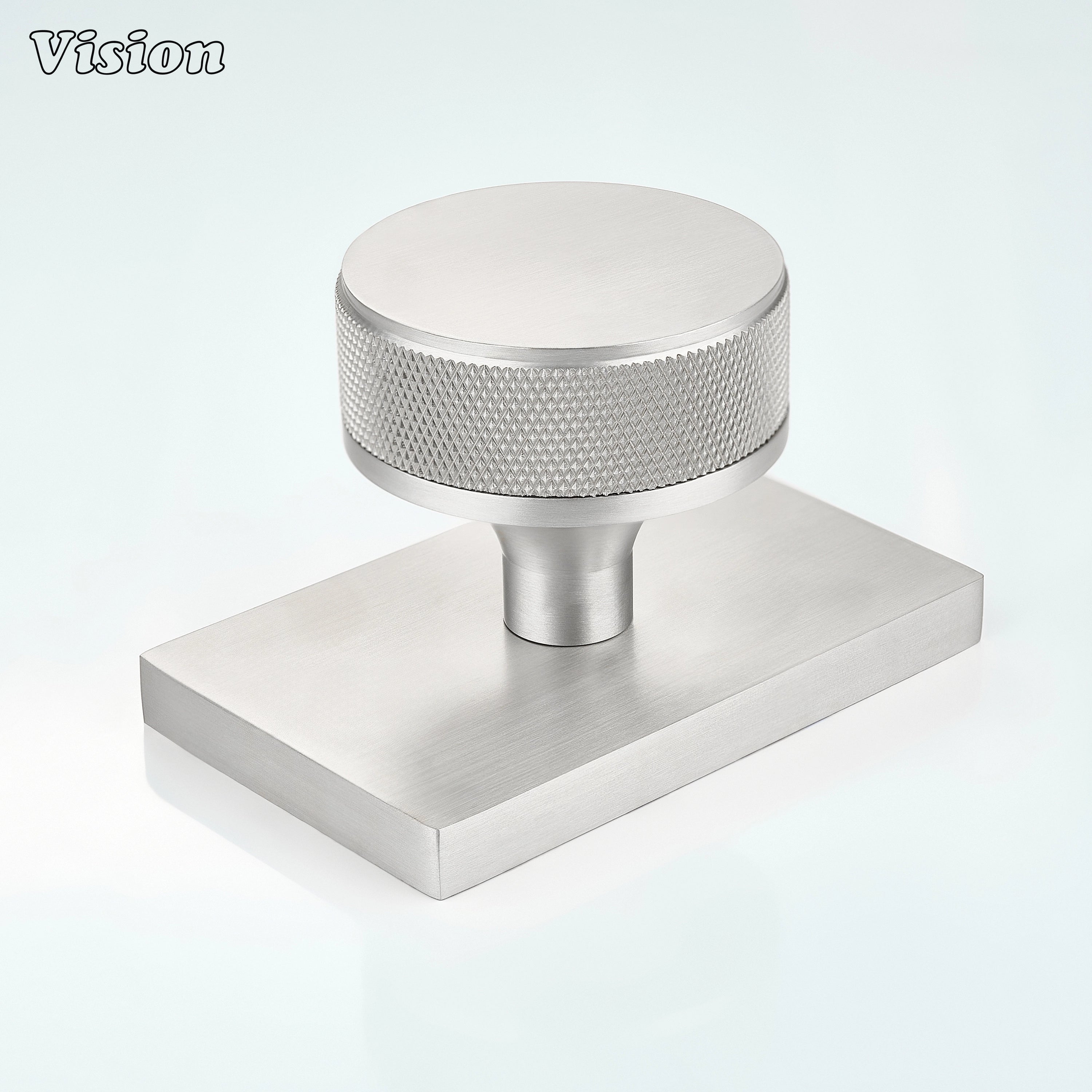 Silver knurled round door knob with rectangular backplate for interior doors