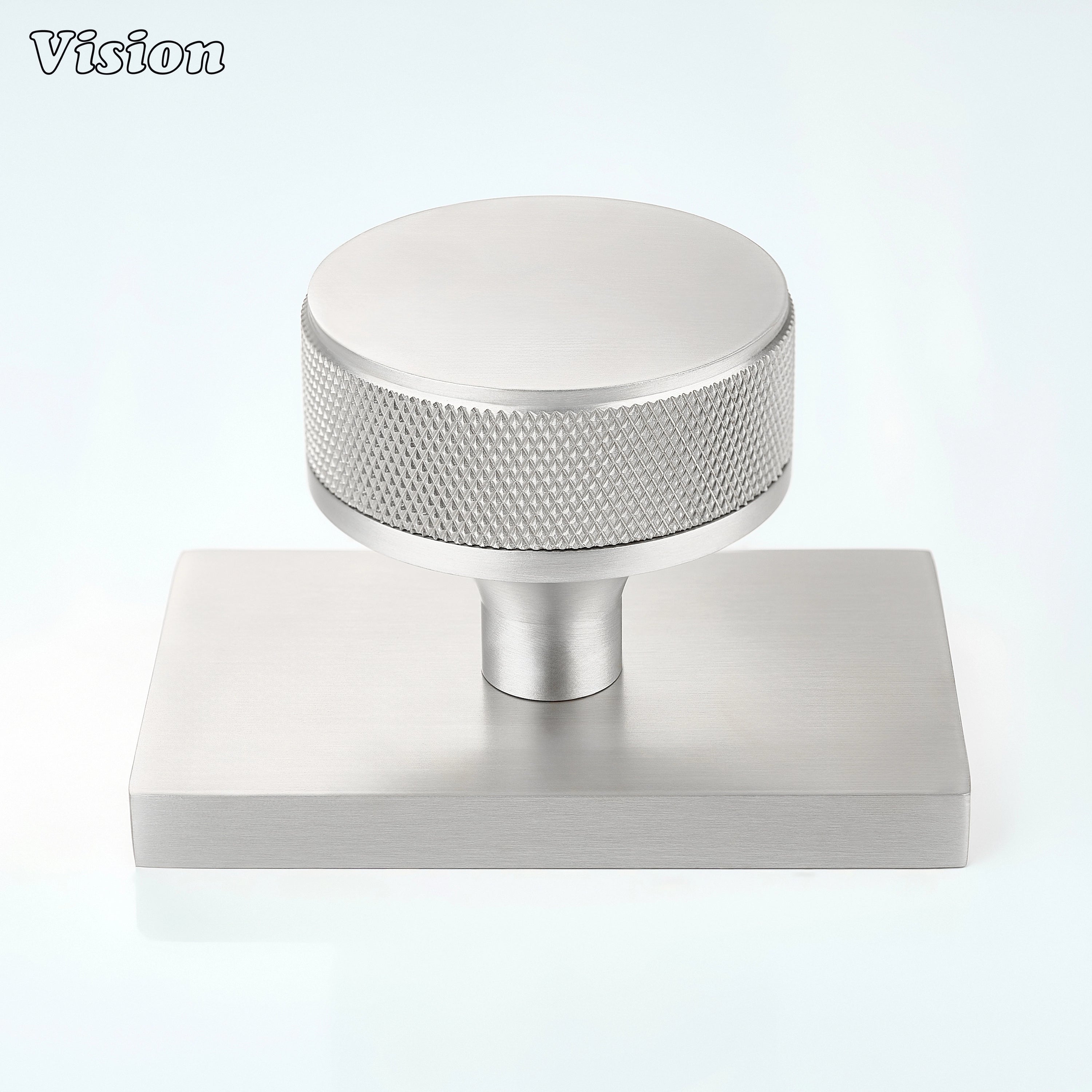 Silver knurled door knob and square backplate for residential interiors