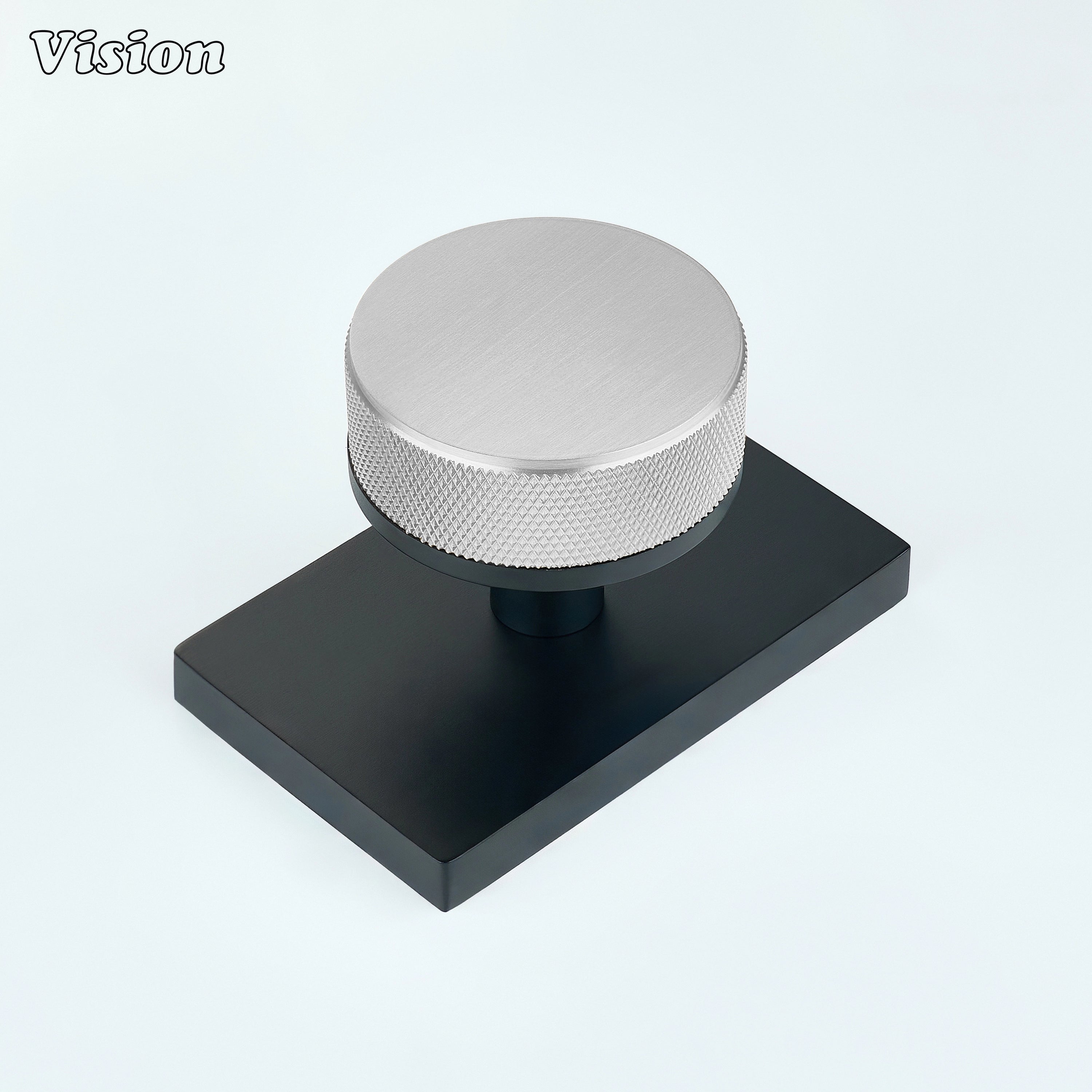 Silver and Black knurled round door knob with silver knob and black rectangular backplate