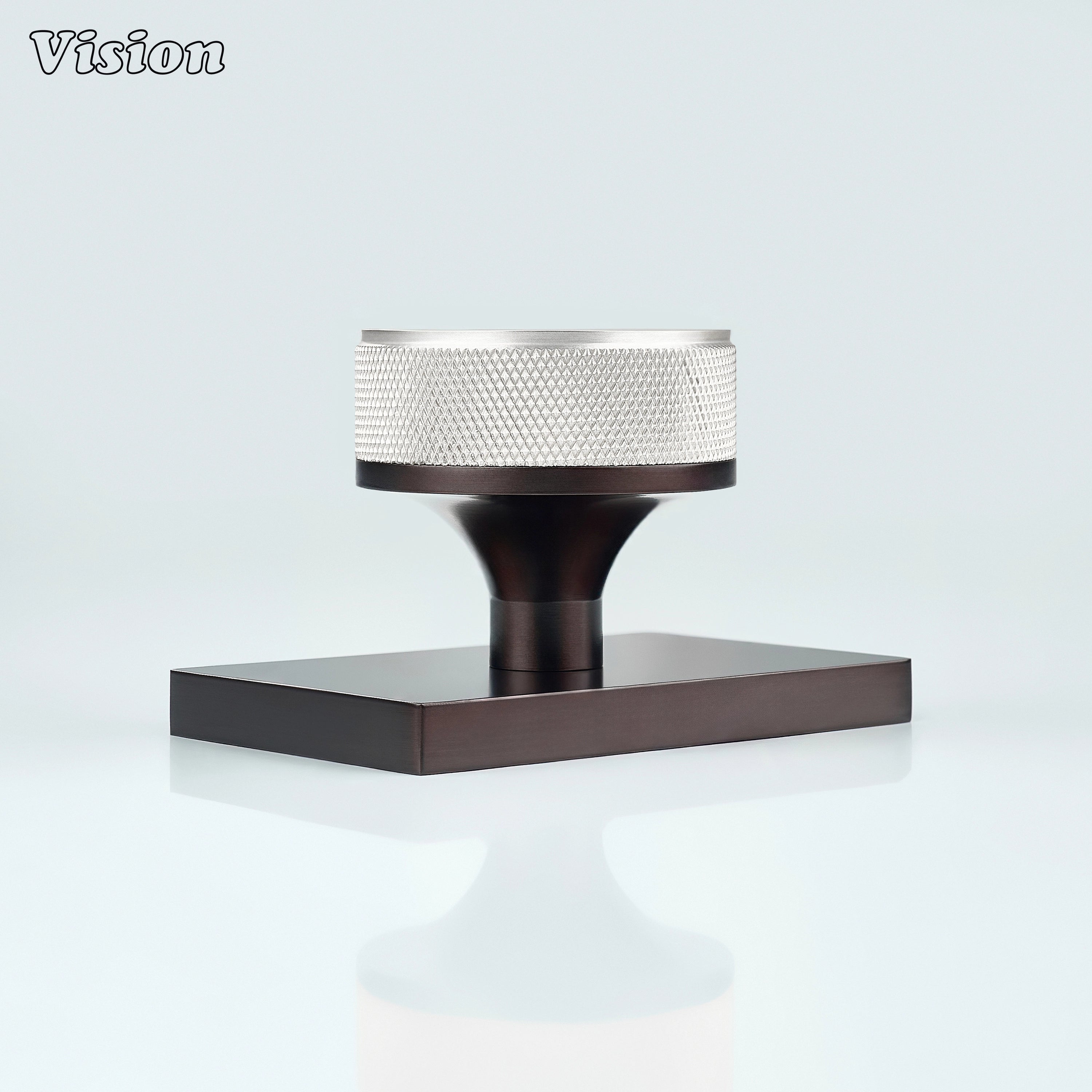 Silver and Oil Rubbed Bronze knurled door knob designed for industrial interiors