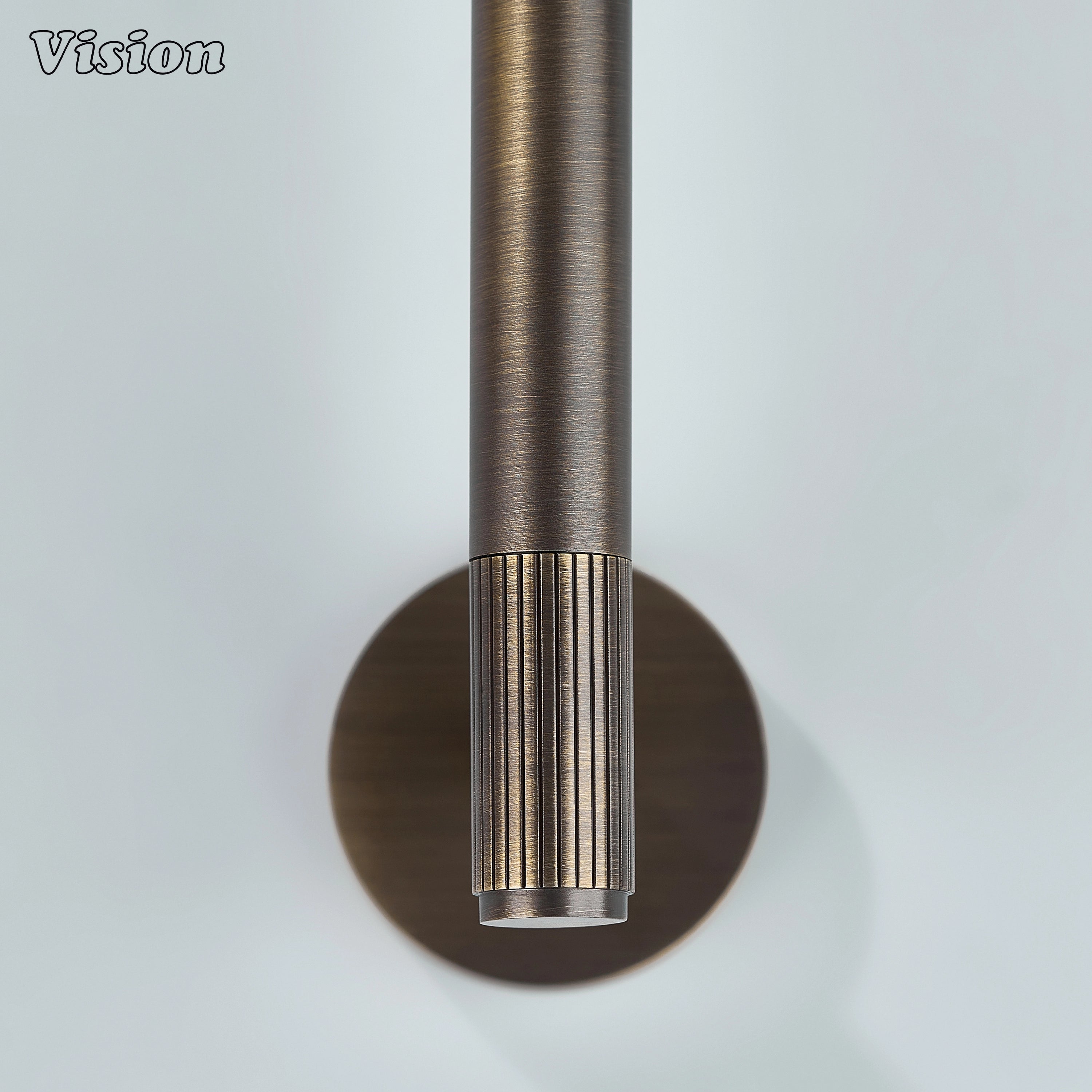 Wall mounted brass towel holder in Antique Bronze with minimalist linear design