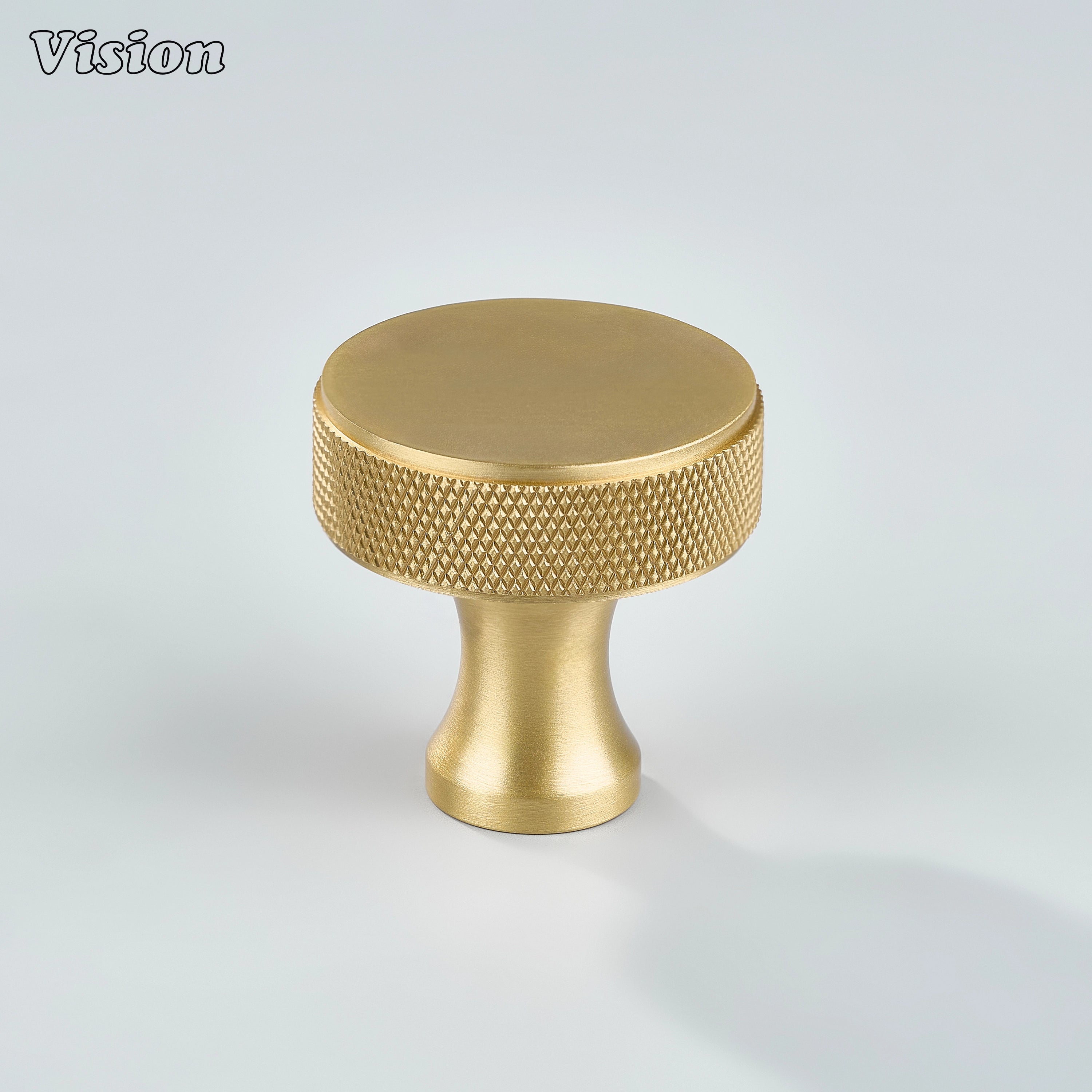 Gold finish knurled cabinet knob with circular profile and textured edge, perfect for bedroom wardrobes