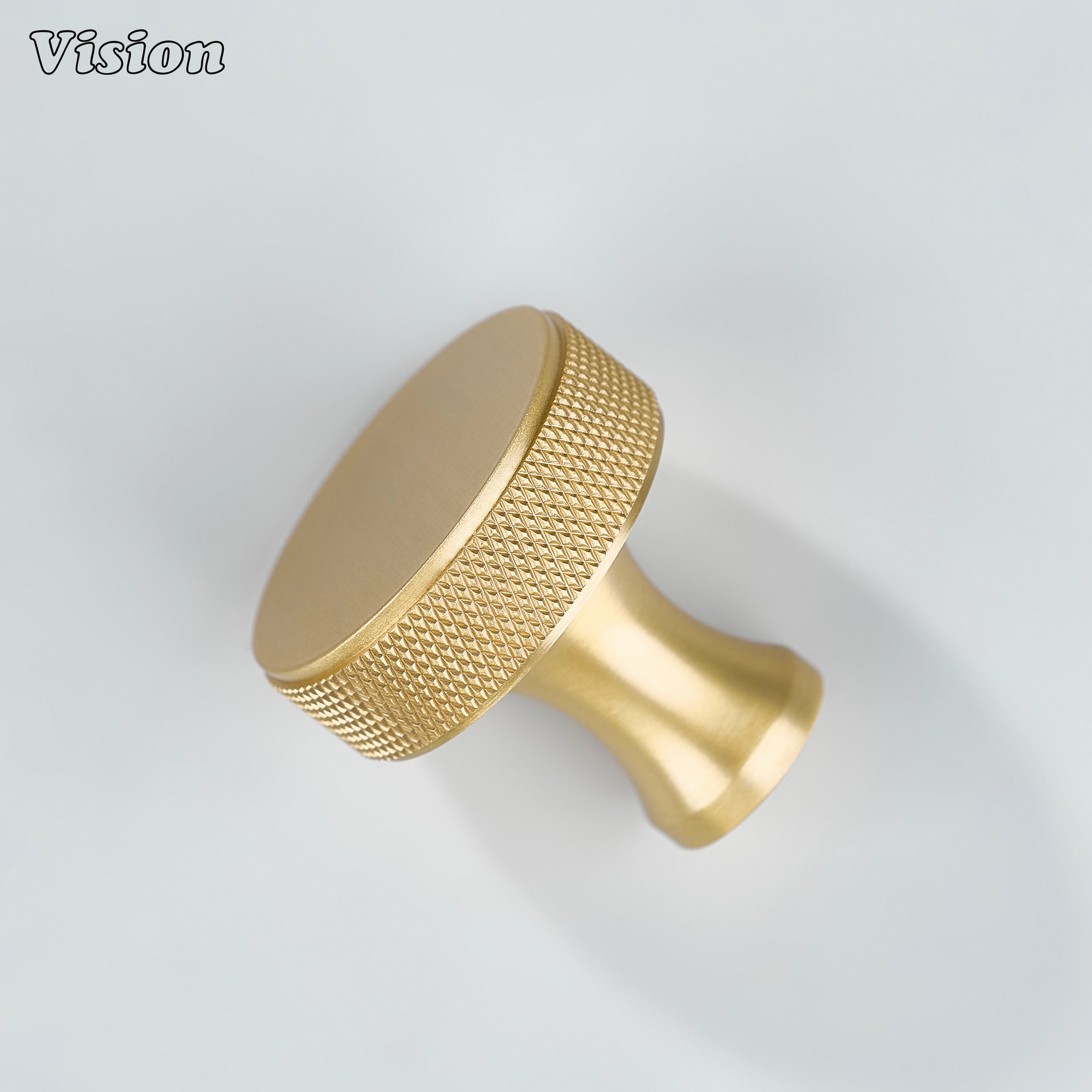 Gold knurled round cabinet knob crafted in brass, suitable for bathroom cabinets and storage drawers