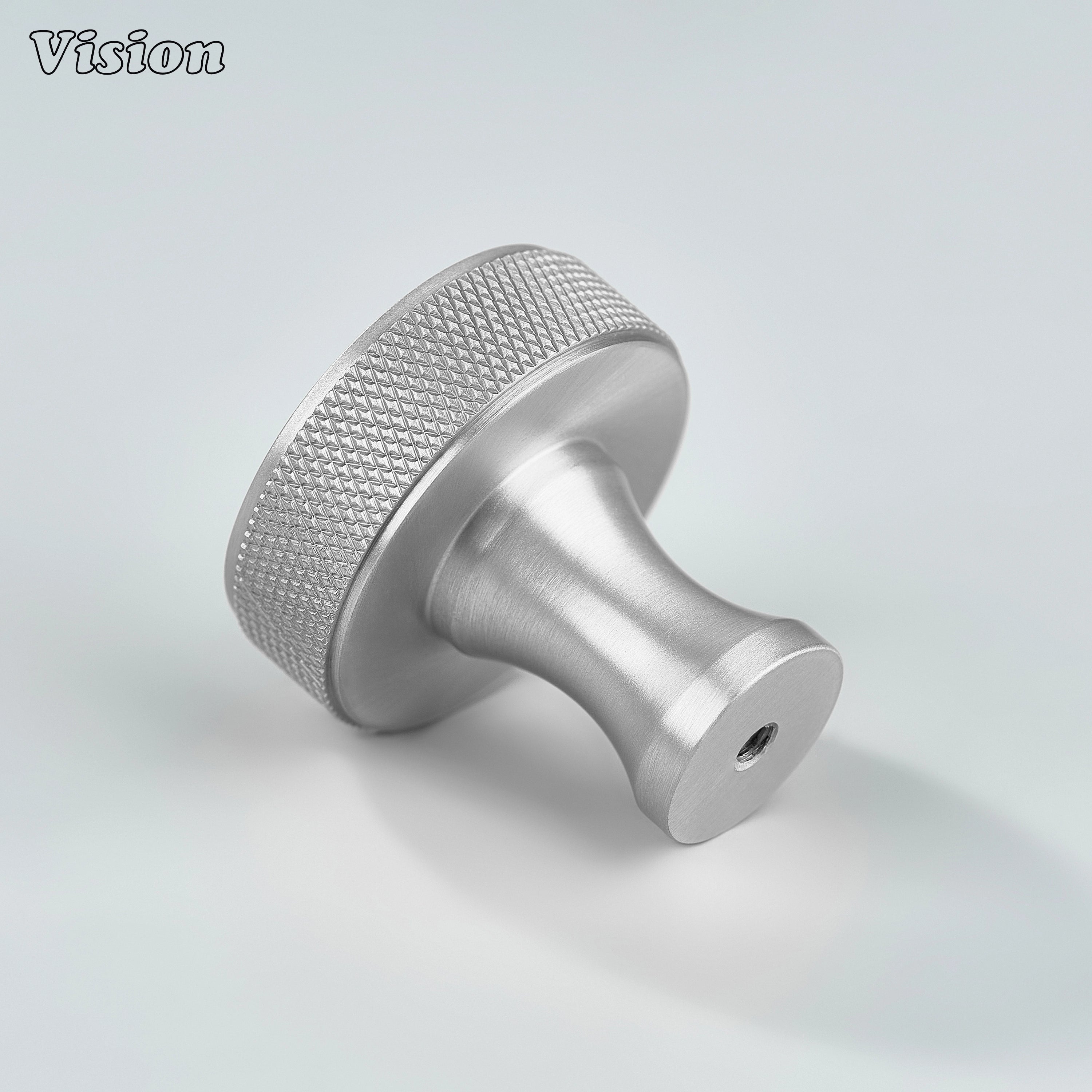 Round cabinet knob in Silver finish with knurled grip detail for furniture