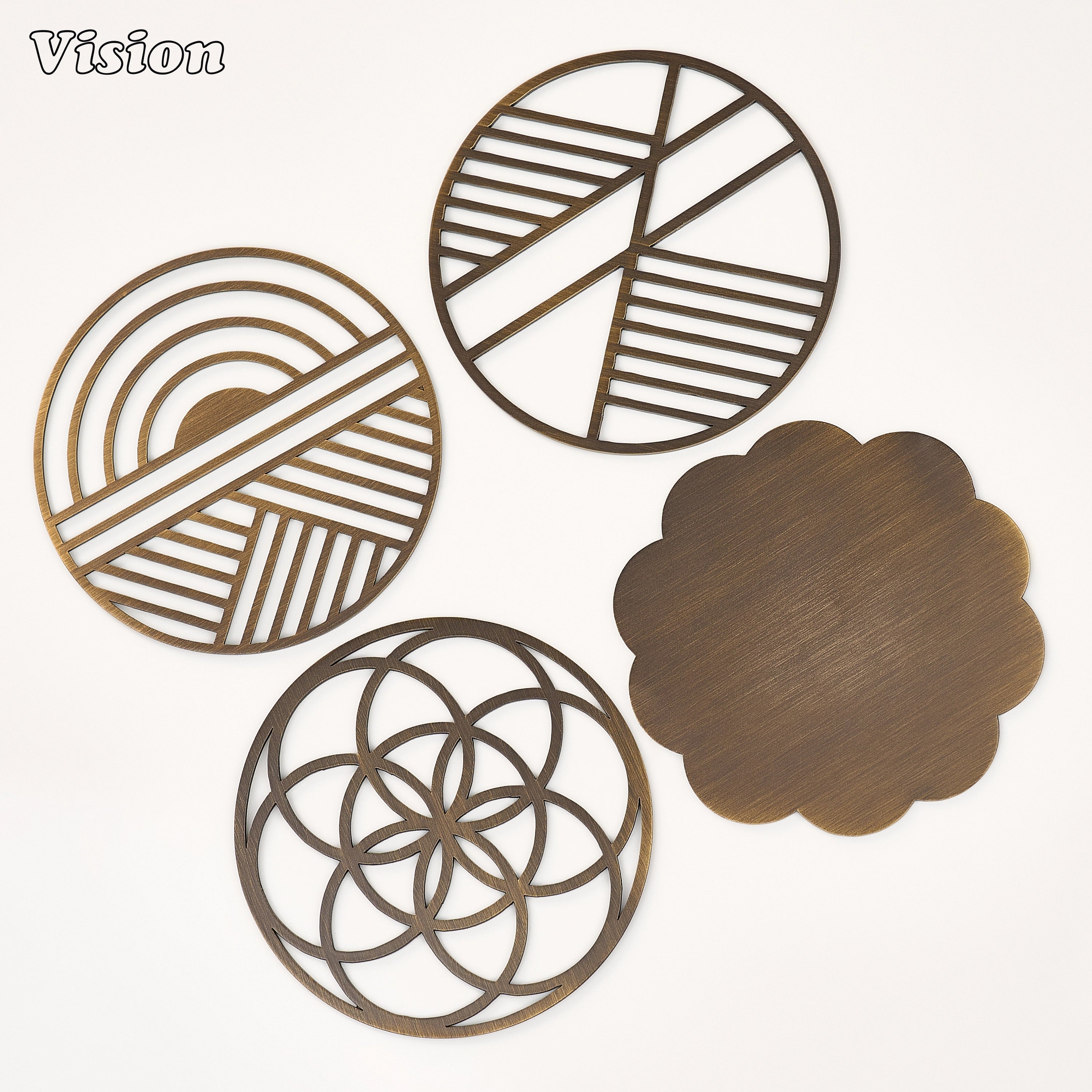 Premium antique bronze floral brass drink coaster with undulating scalloped cuts protecting a marble coffee table