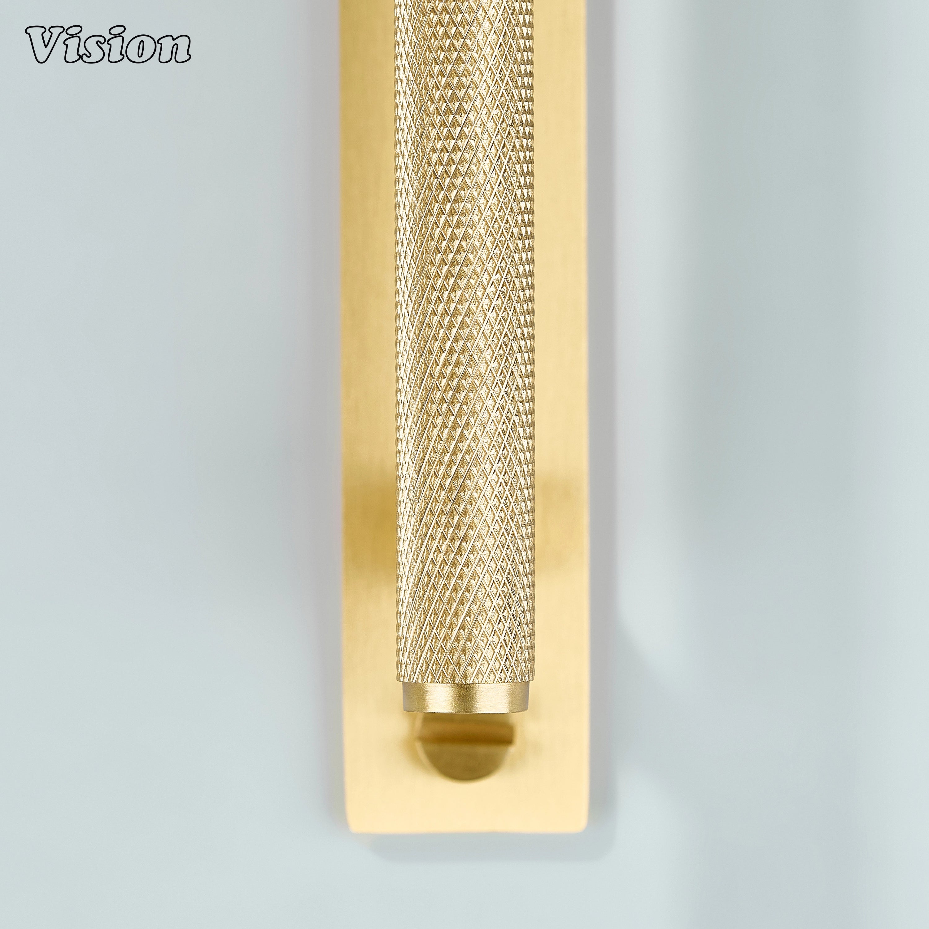 Knurled Gold cabinet handle highlighting textured grip for furniture
