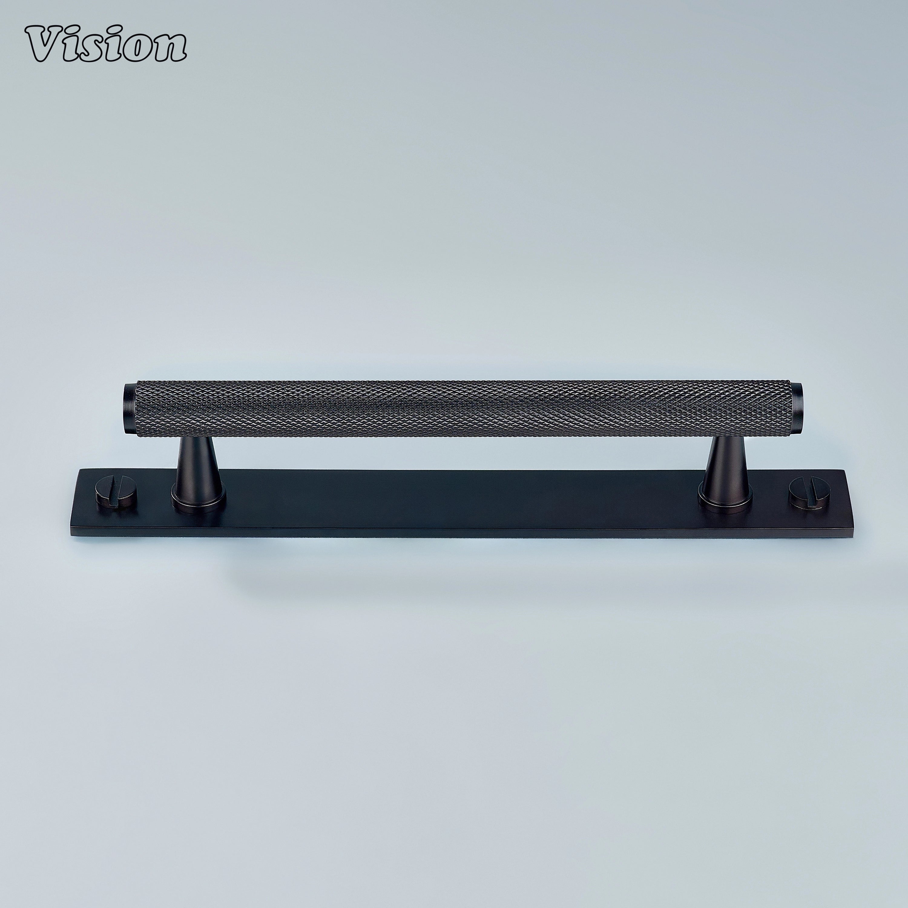 Knurled Oil Rubbed Bronze cabinet handle mounted on furniture panels
