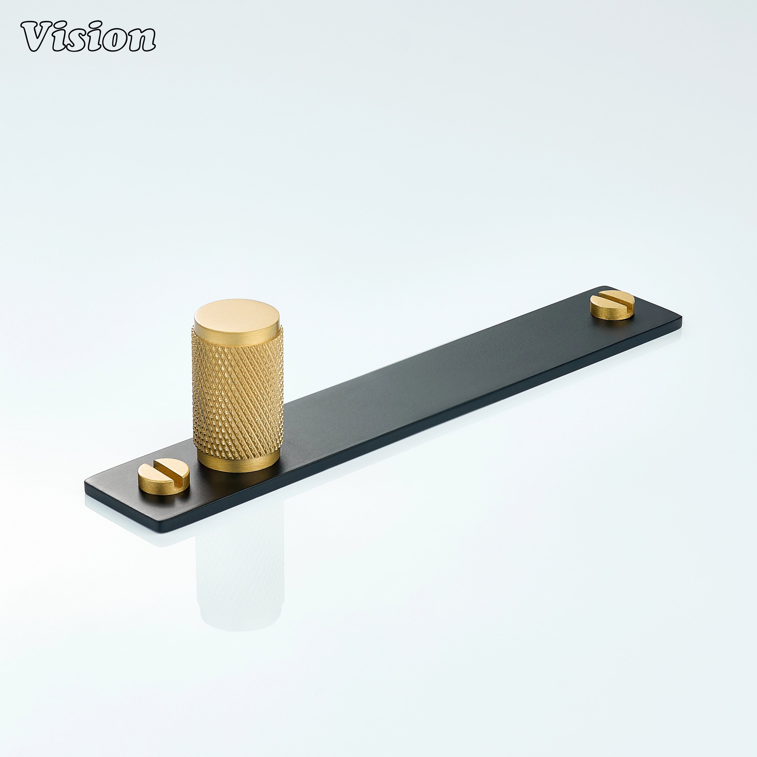 Gold and Black knurled cabinet knob with cylindrical brass grip and black rectangular backplate for kitchen cabinets