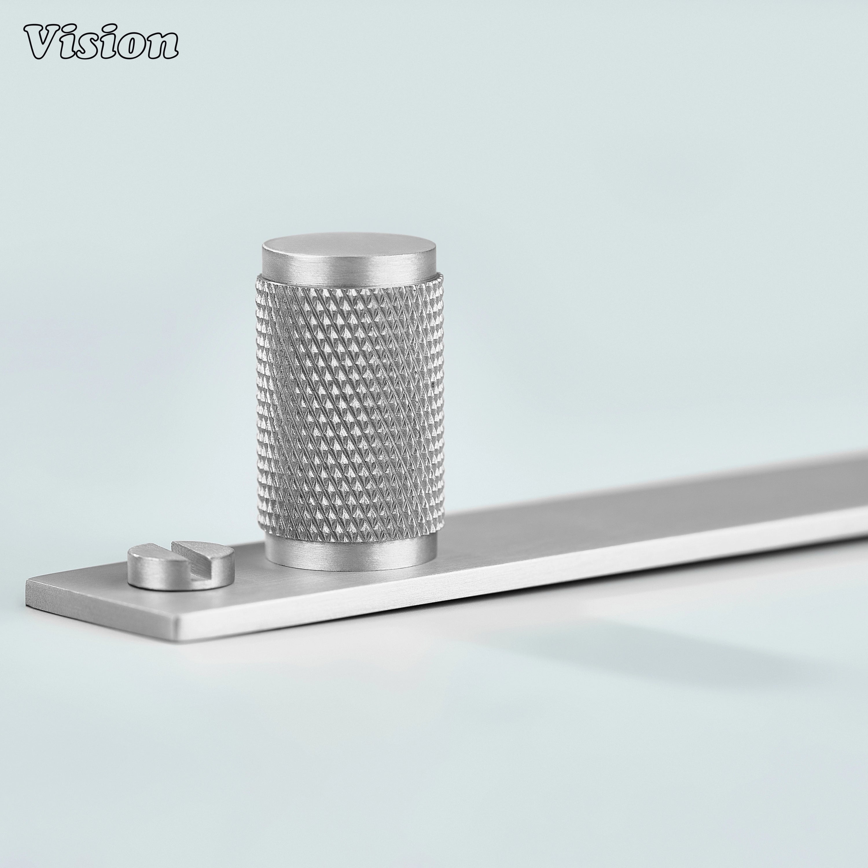 Silver cabinet knob featuring knurled round cylinder and rectangular backplate for wardrobes