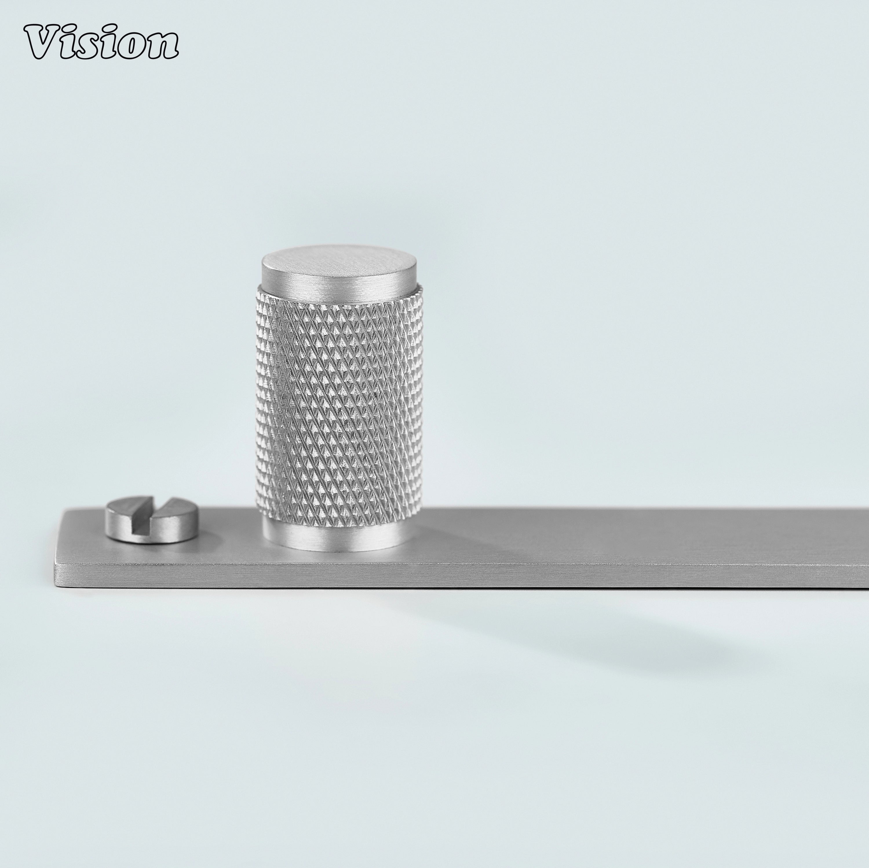 Silver knurled cabinet knob with round brass cylinder for interior furniture