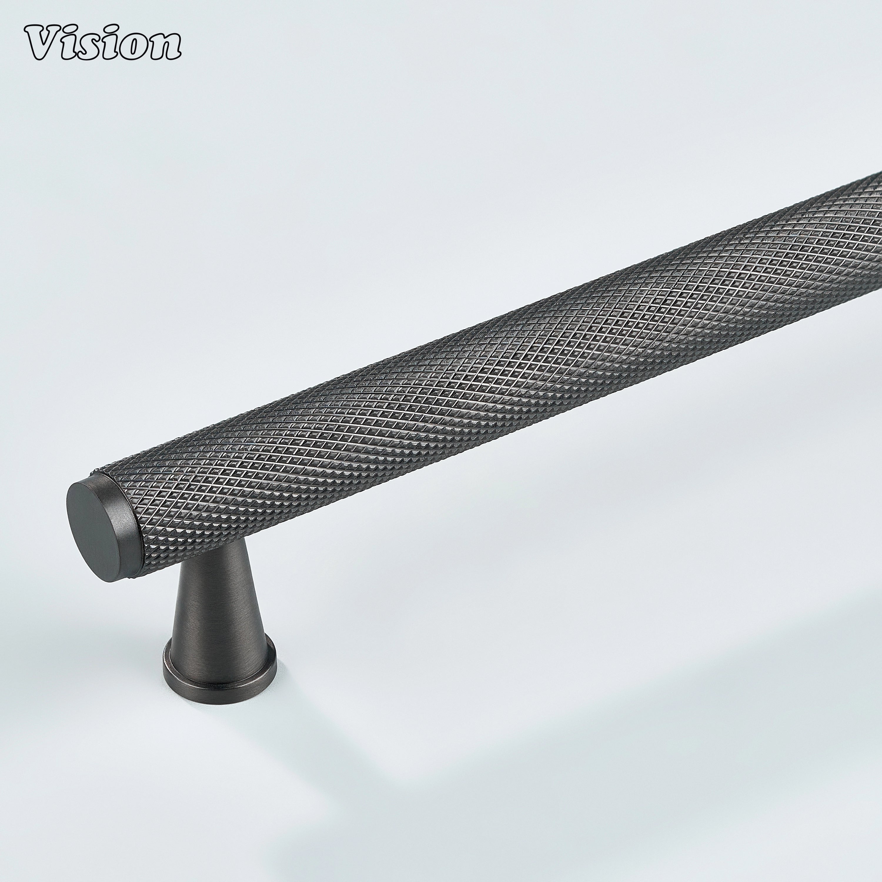 Gunmetal knurled cabinet handle with cone legs for kitchen use.