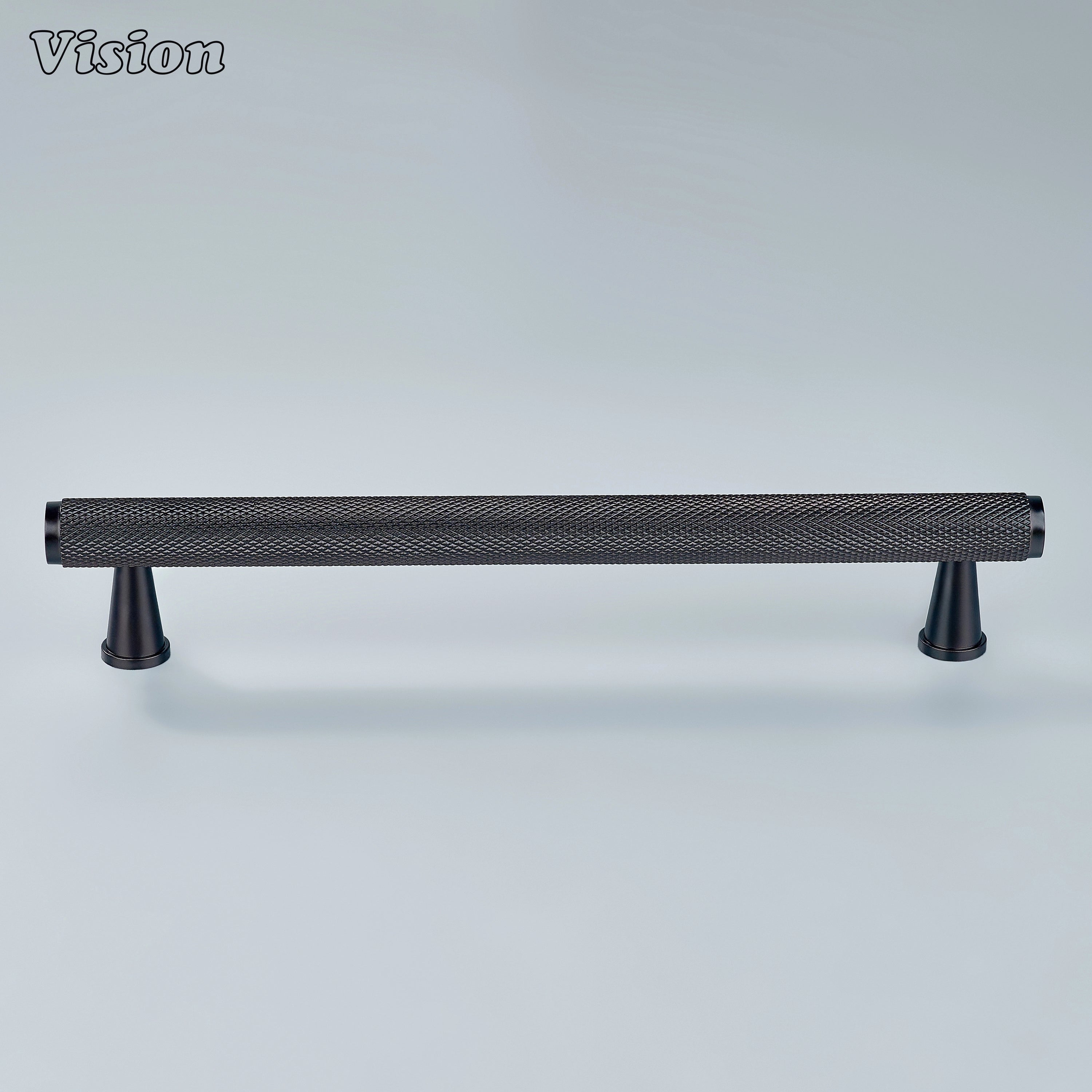 Oil rubbed bronze knurled pull installed on cupboards.