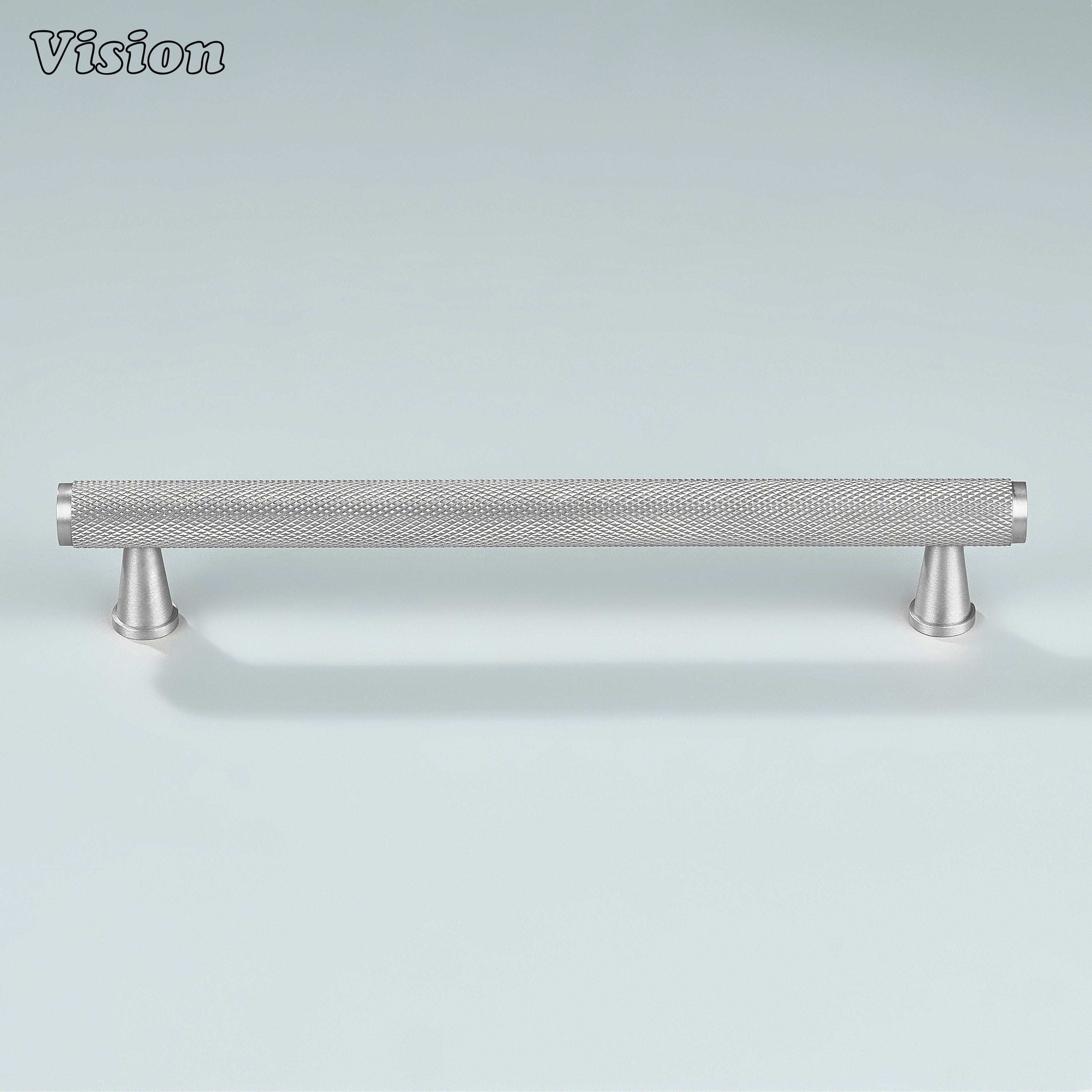 Silver knurled cabinet pull installed on cupboards.