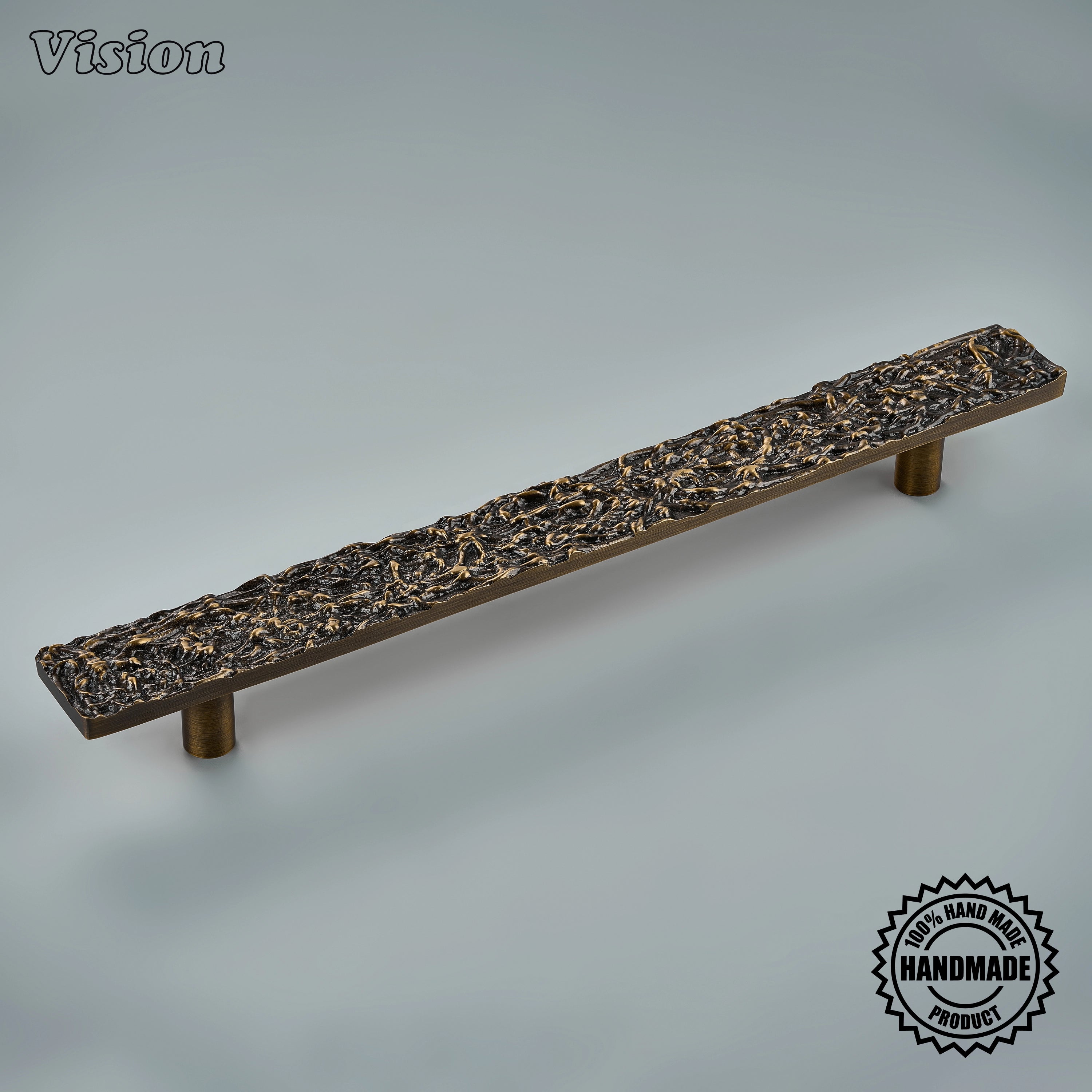 Antique Bronze handcrafted appliance pull with interwoven moss texture on tall custom pantry doors