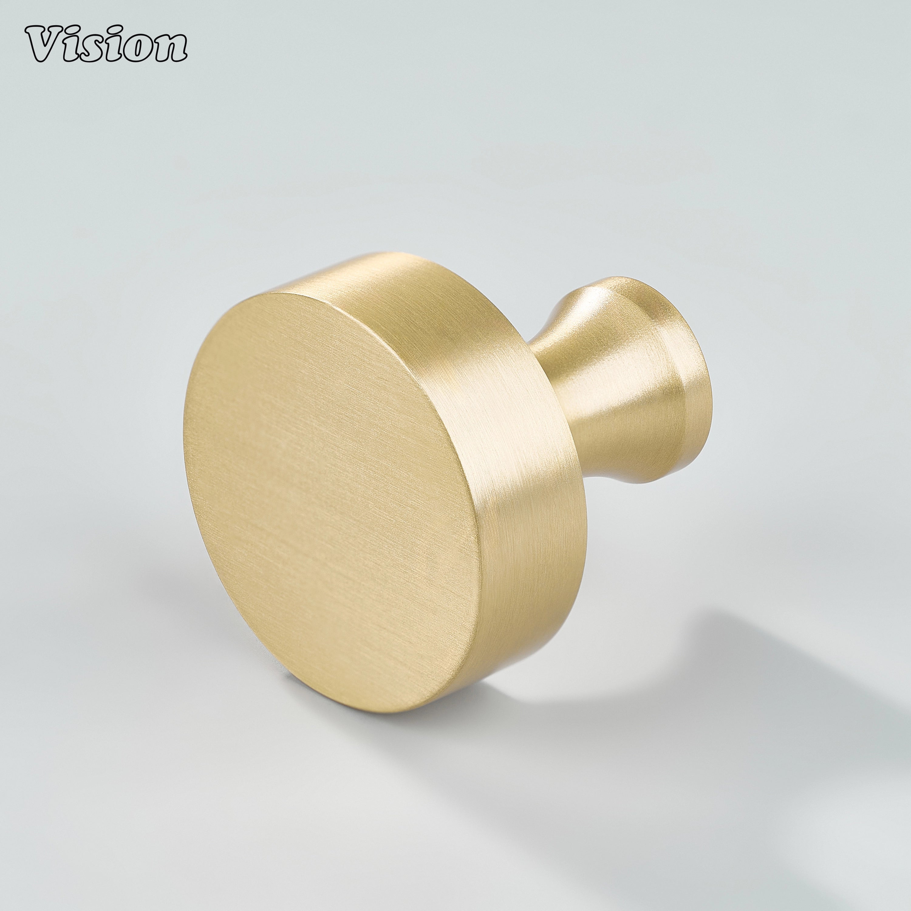 Gold plain round cabinet knob with flat face and curved stem for modern kitchen cabinets