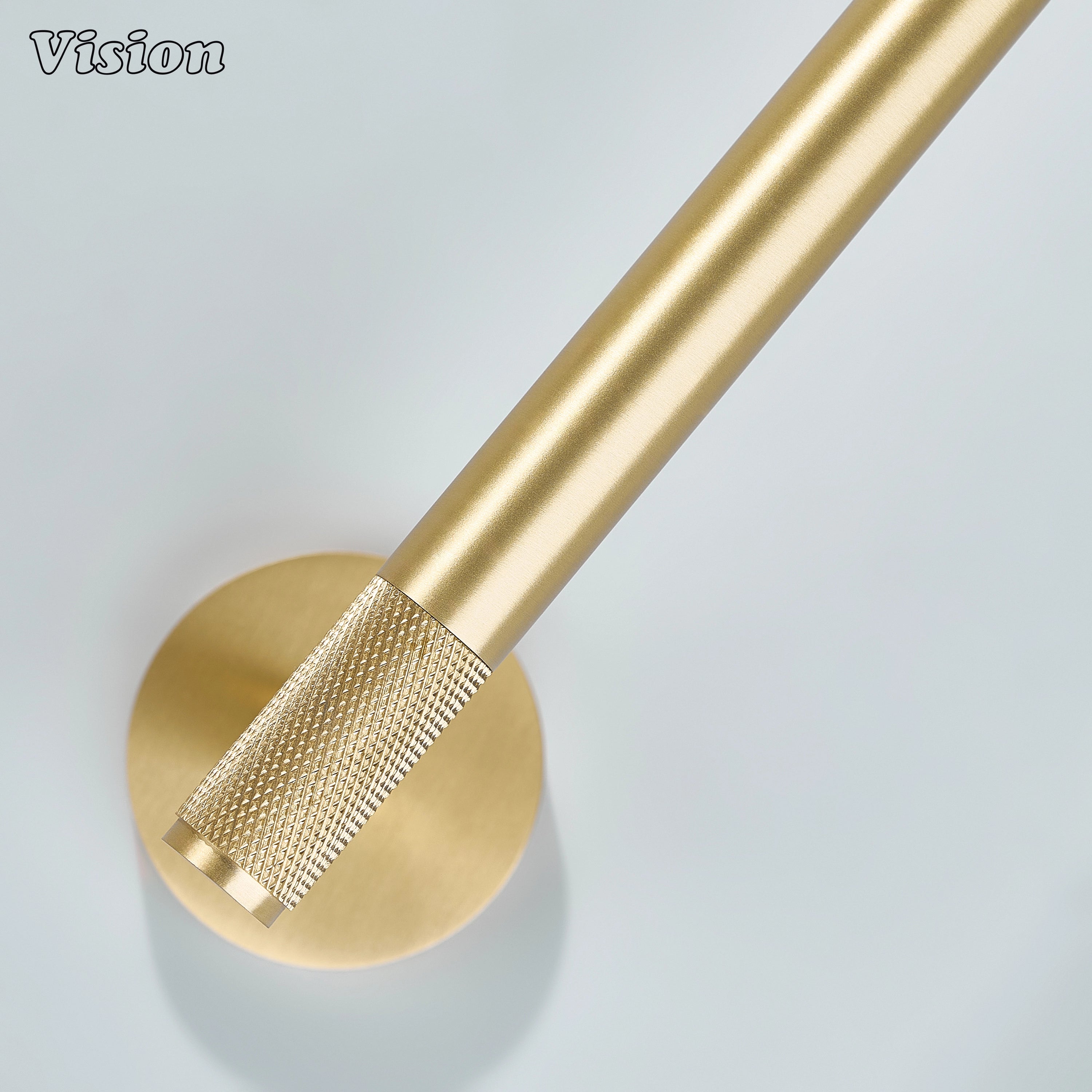 Gold knurled brass toilet paper holder designed for residential toilet spaces
