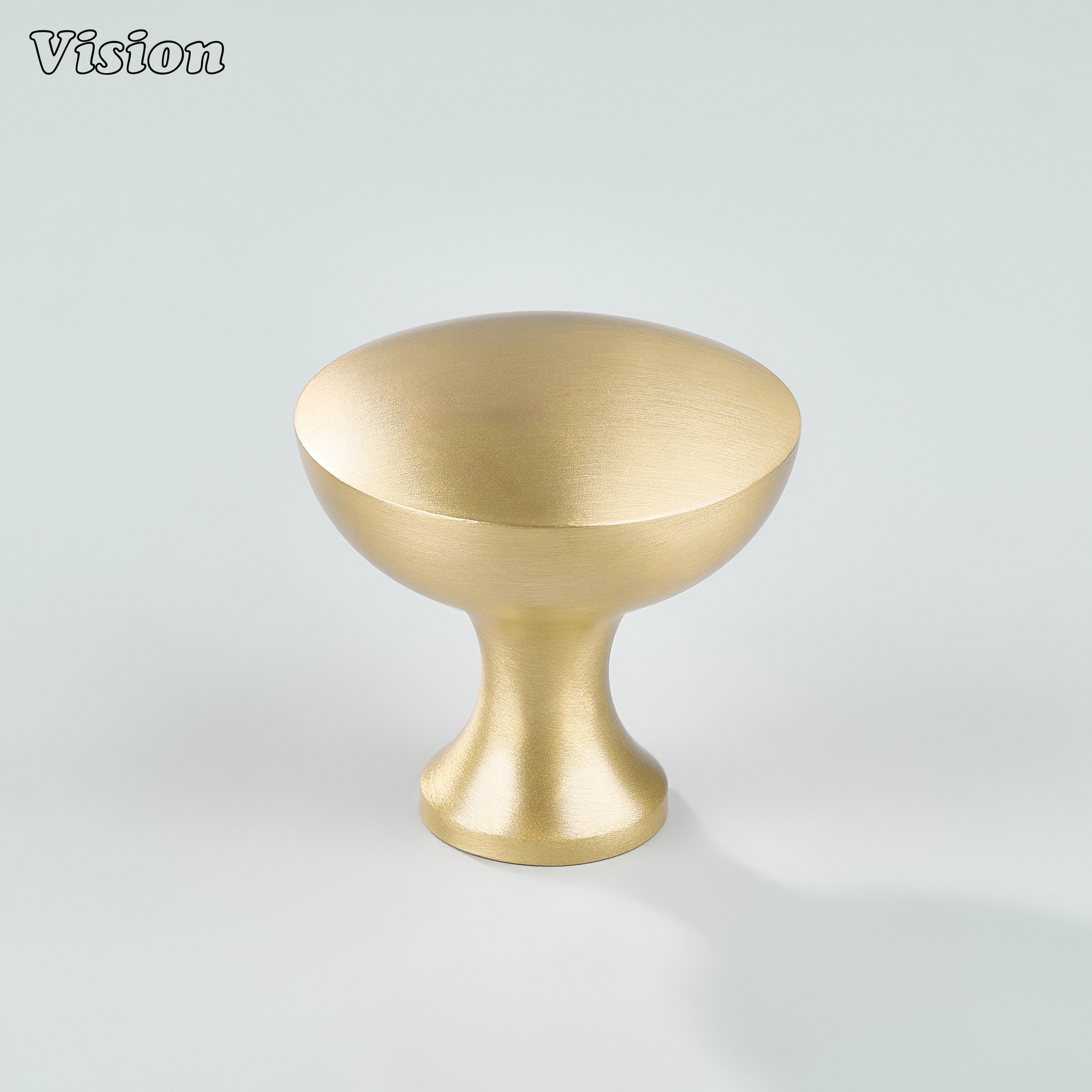 Gold round cabinet knob with beveled profile and tapered base for furniture units