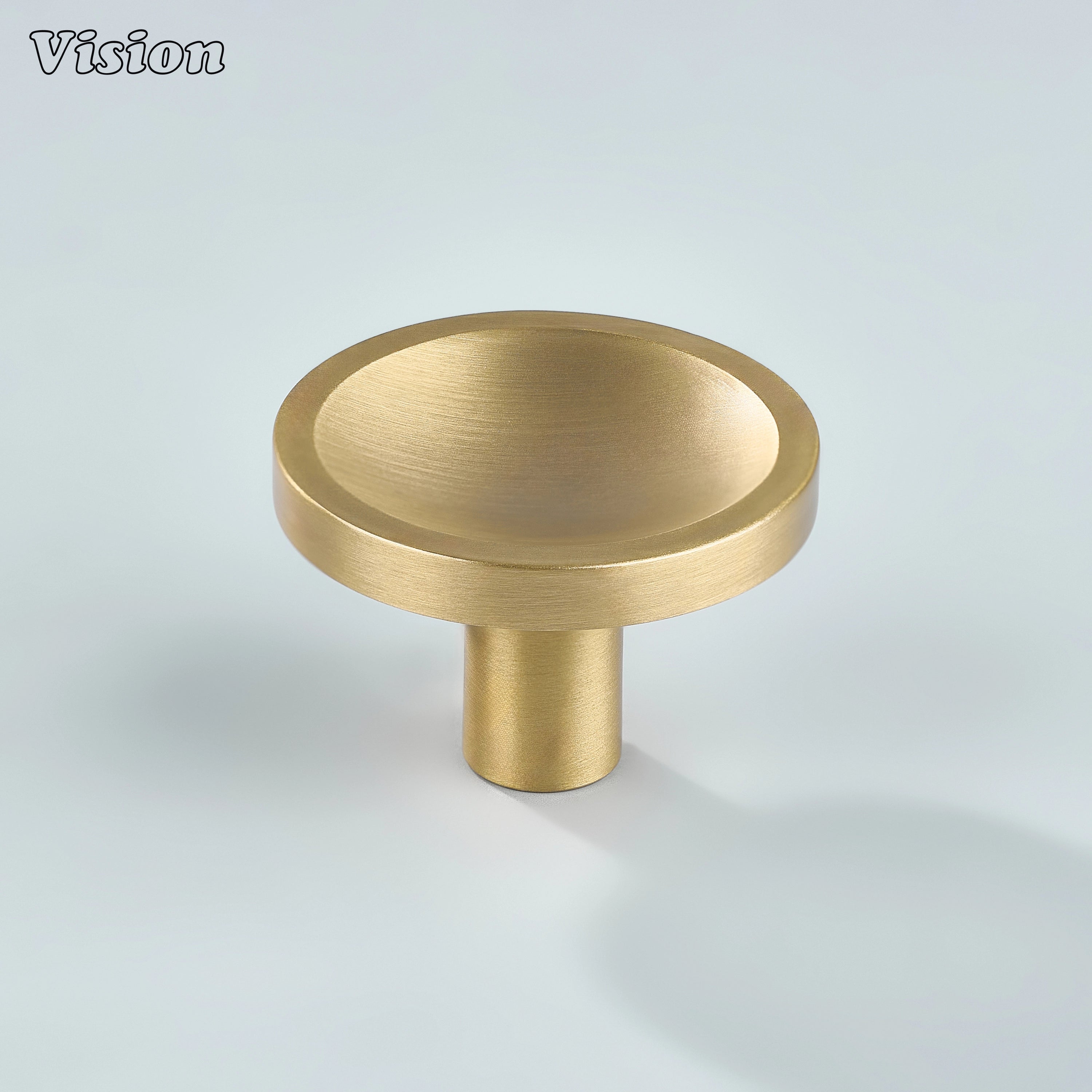Gold round cabinet knob with concave top design for luxury kitchen cabinetry