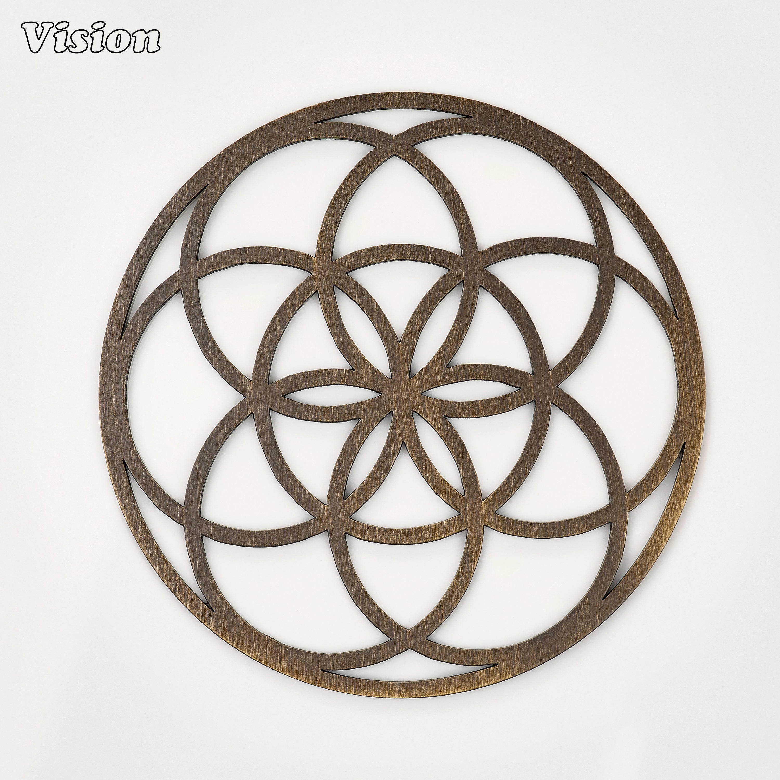 Antique Bronze solid brass round coaster featuring continuous overlapping circles on a wooden bar cart