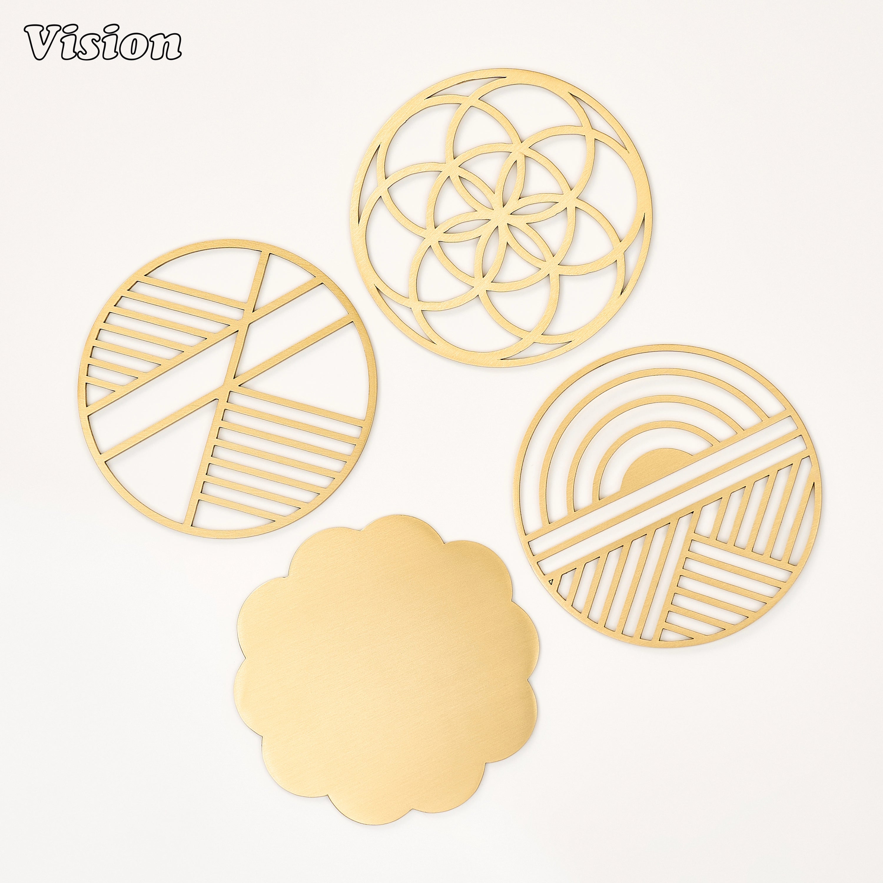 Premium gold precision-cut brass coaster with intersecting circle framework on a marble coffee table