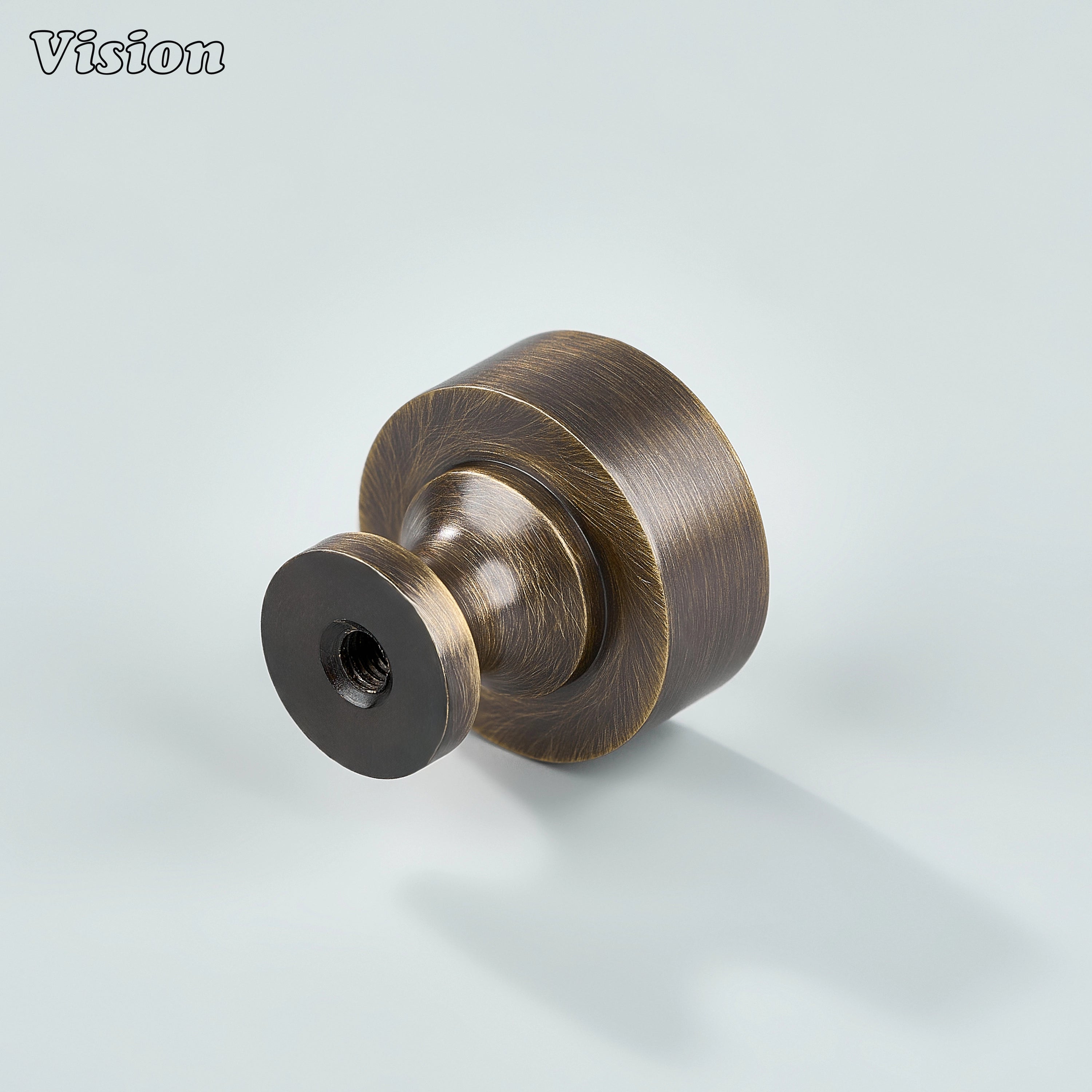 Small round Antique Bronze cabinet knob used on wardrobe doors