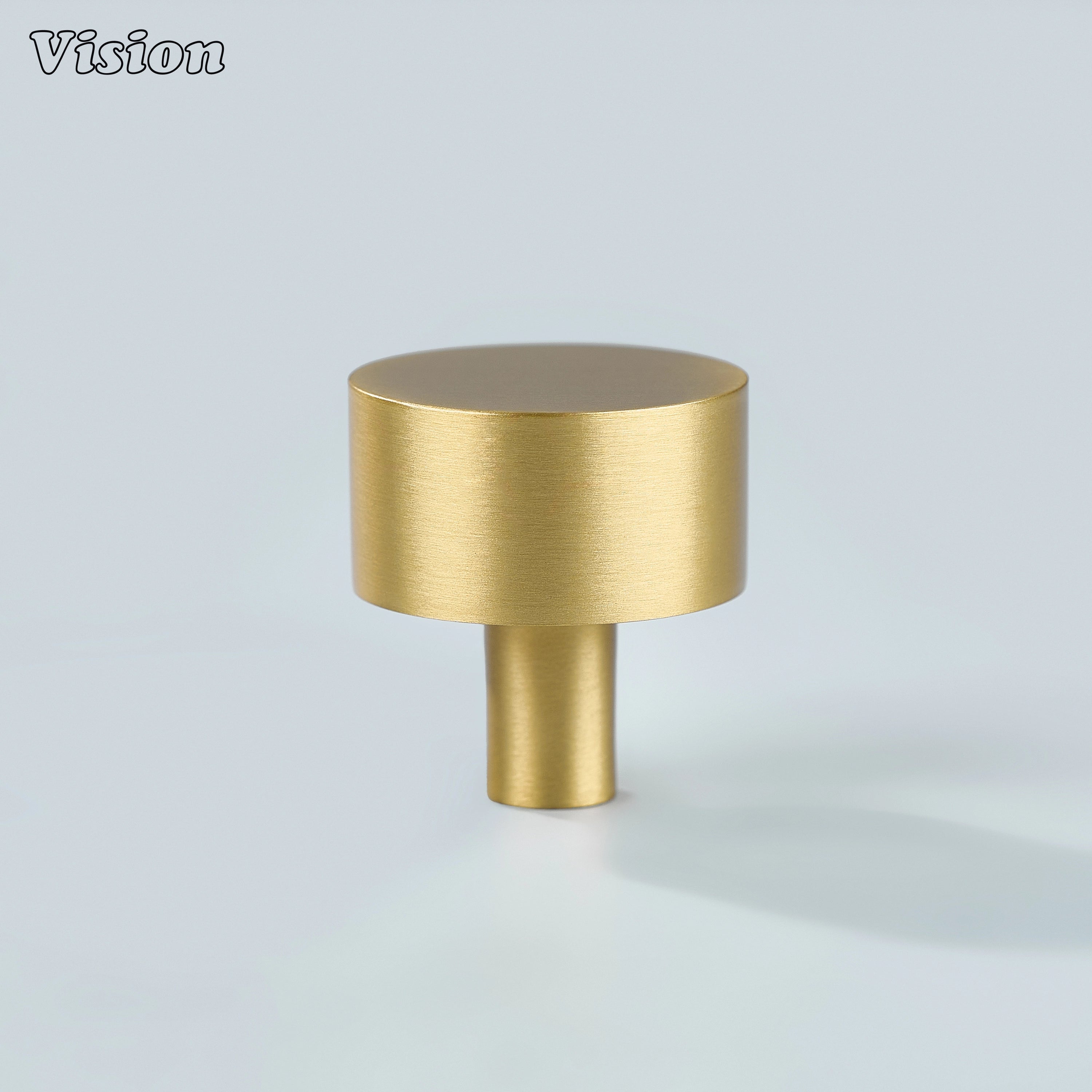 Gold round cabinet knob in plain solid brass design for wardrobe doors and drawers