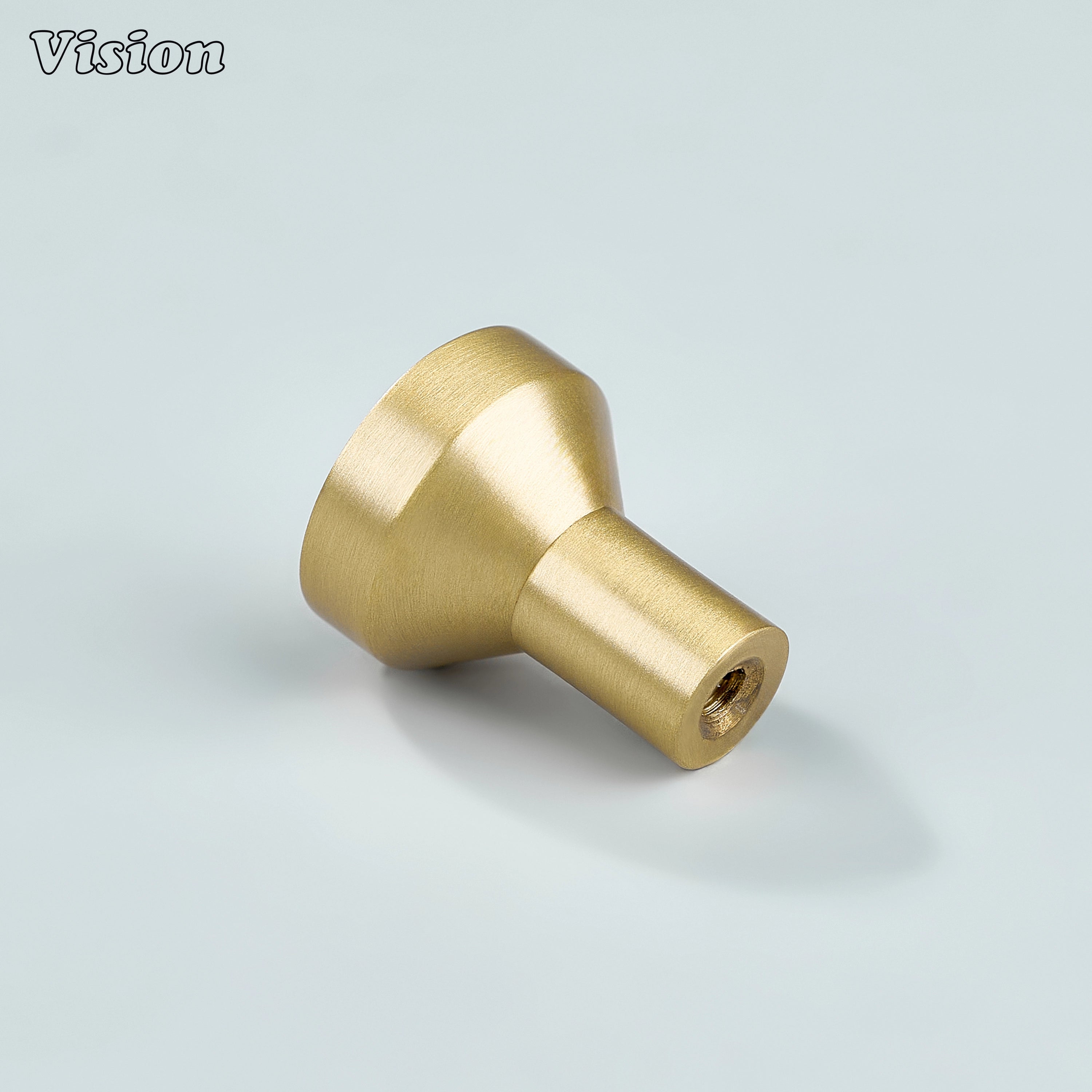 Minimal round cabinet knob in Gold finish with cylindrical base for drawer fronts and furniture