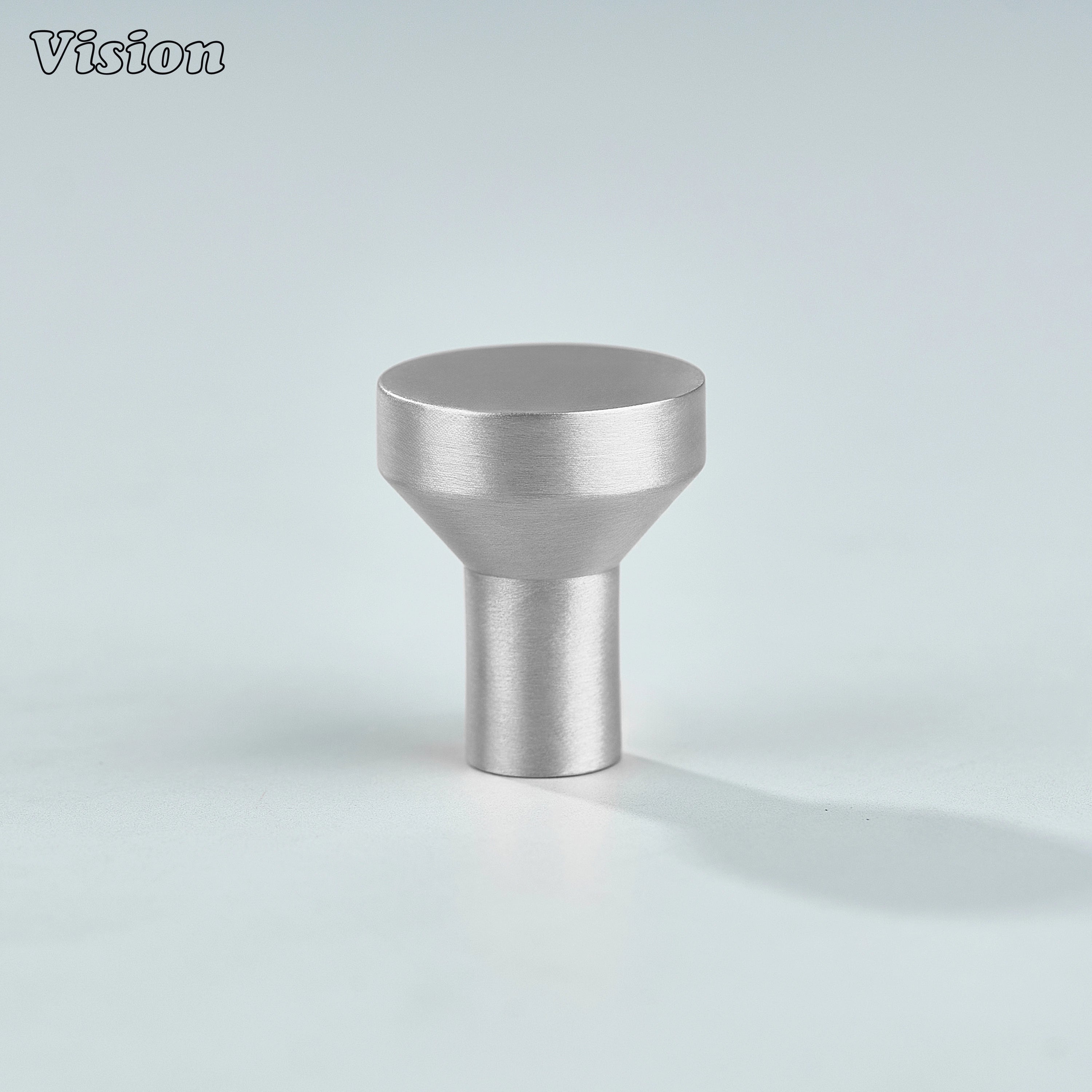 Silver cabinet knob with smooth flat round top and cylindrical base for wardrobe doors