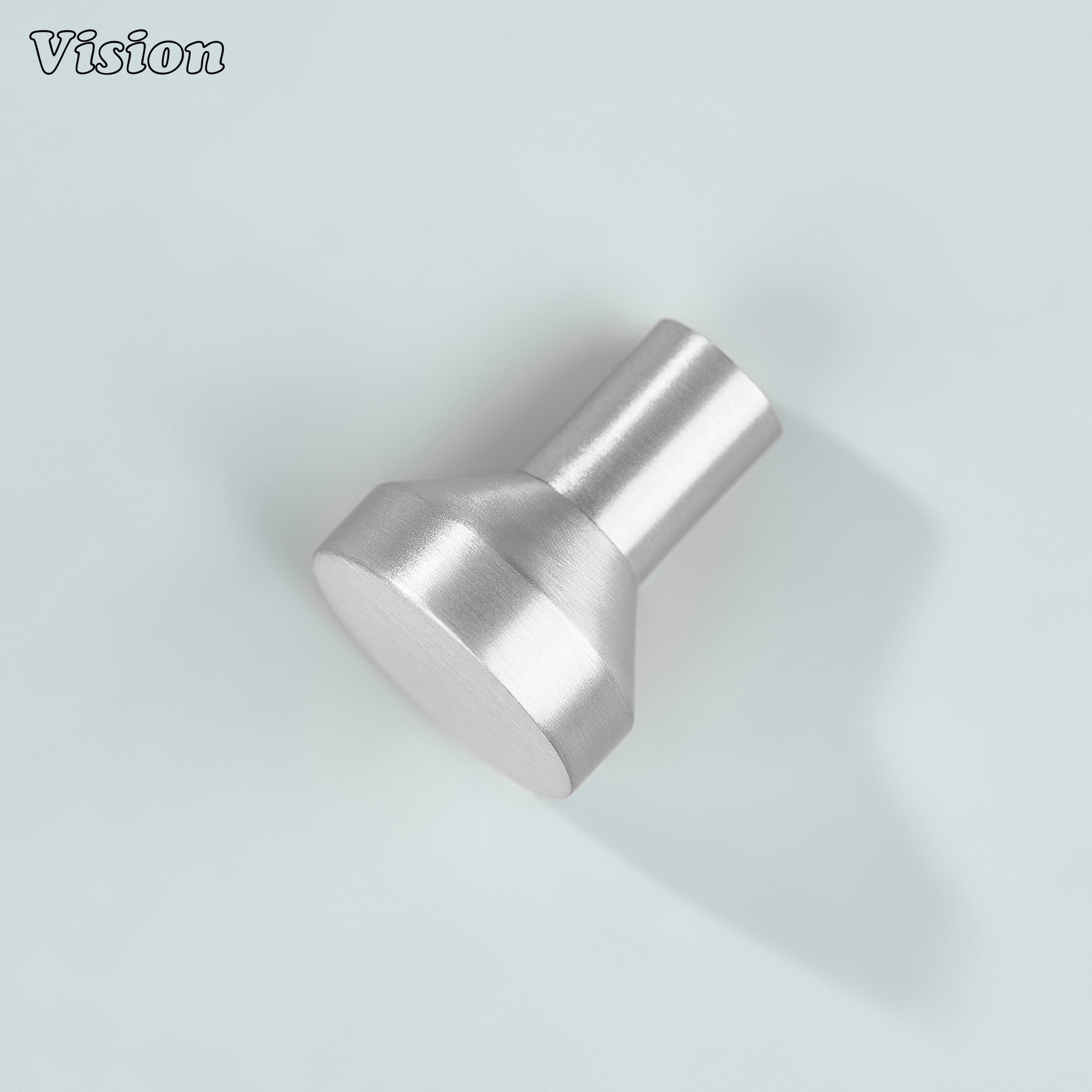 Silver round cabinet knob with smooth surface for kitchen storage units