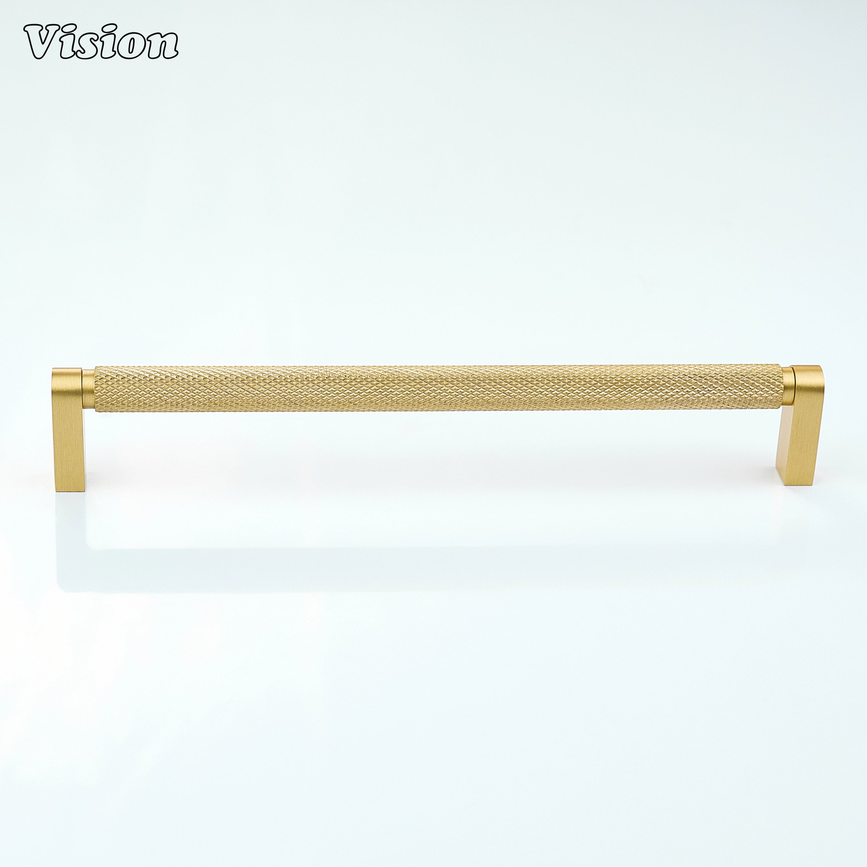 Gold ripple knurled cabinet handle installed on closet doors.