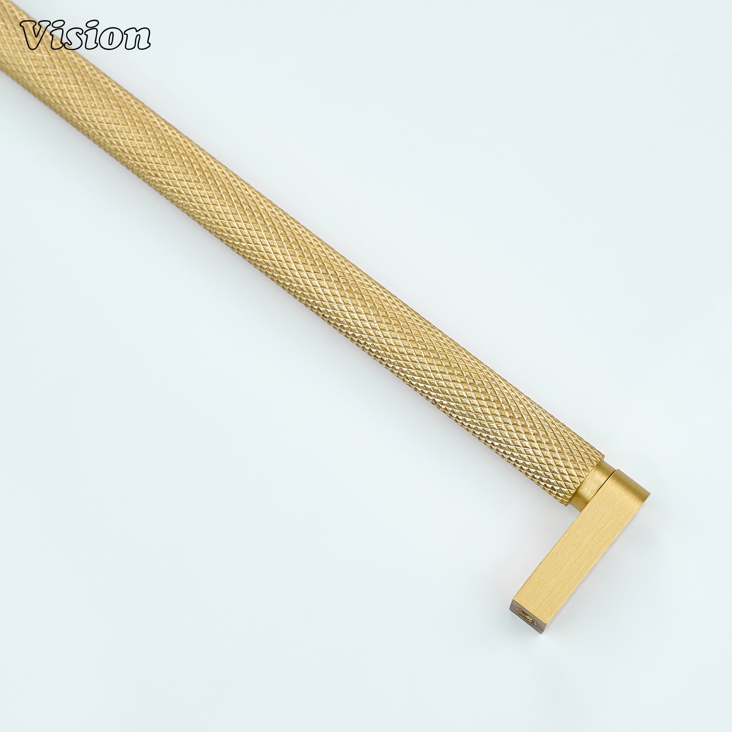 Gold ripple knurled cabinet handle used on modular kitchen setups.
