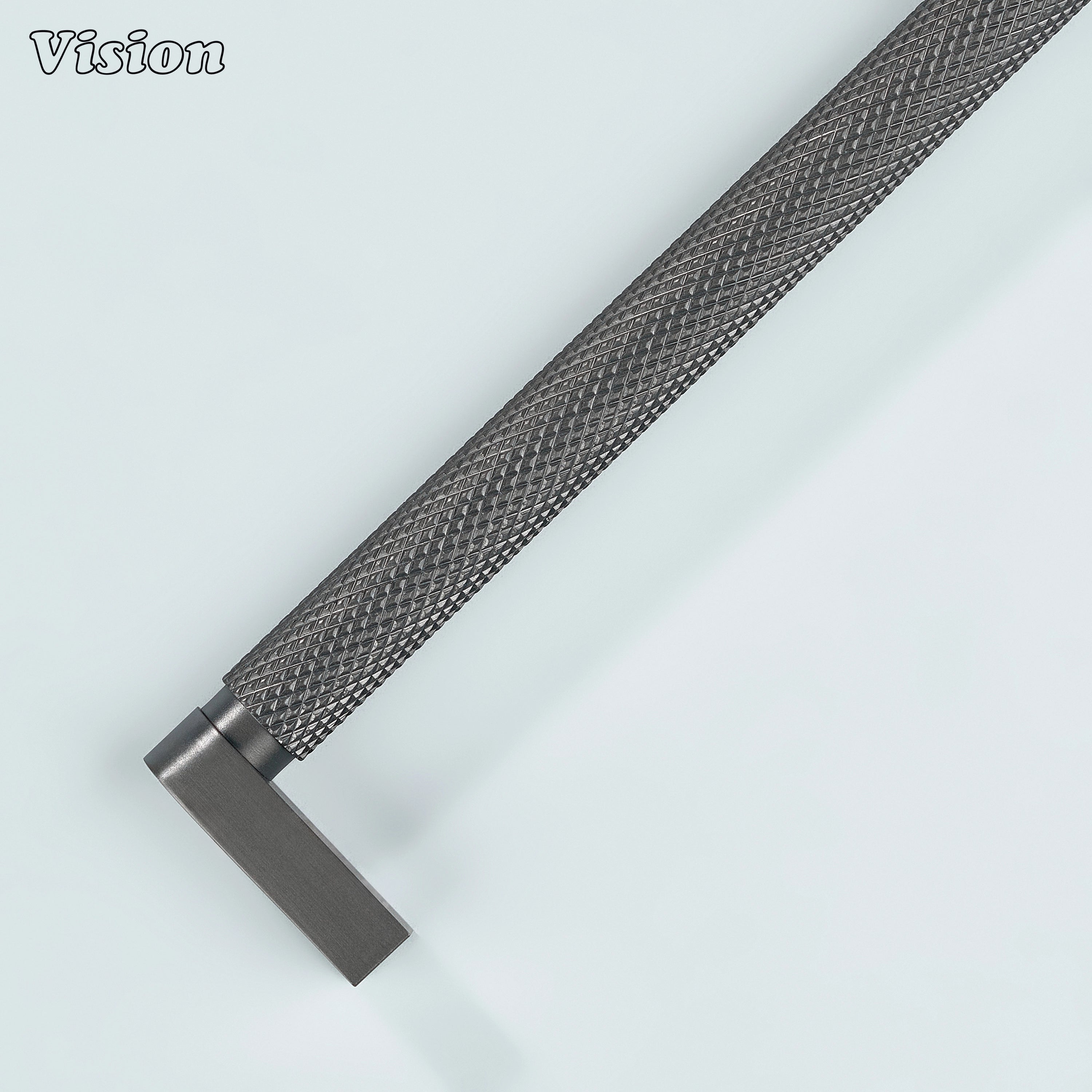 Gunmetal ripple knurled cabinet handle installed on vanity drawers.