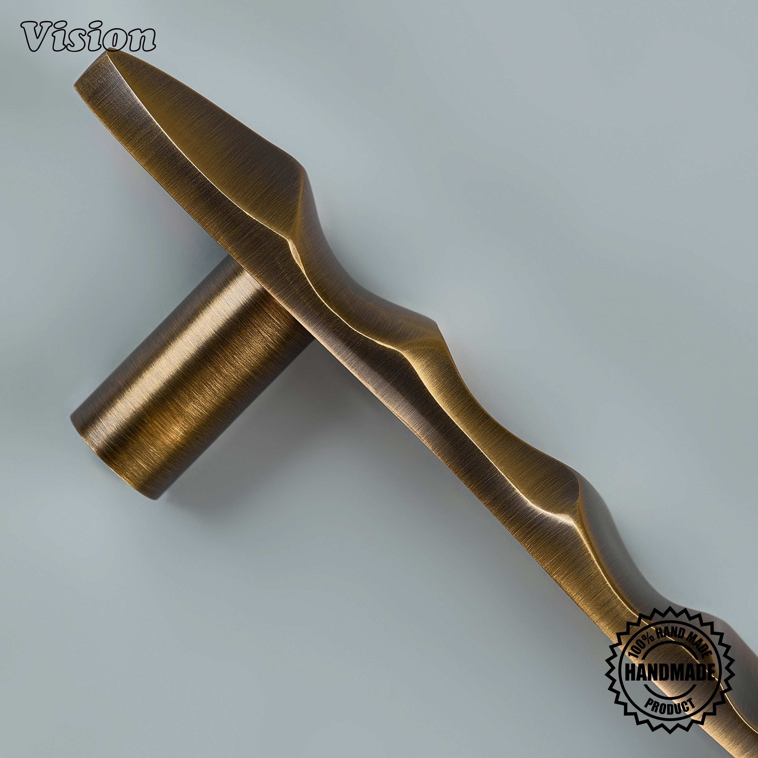 Luxury antique bronze sculpted brass pull with round mounting posts on integrated dishwashers