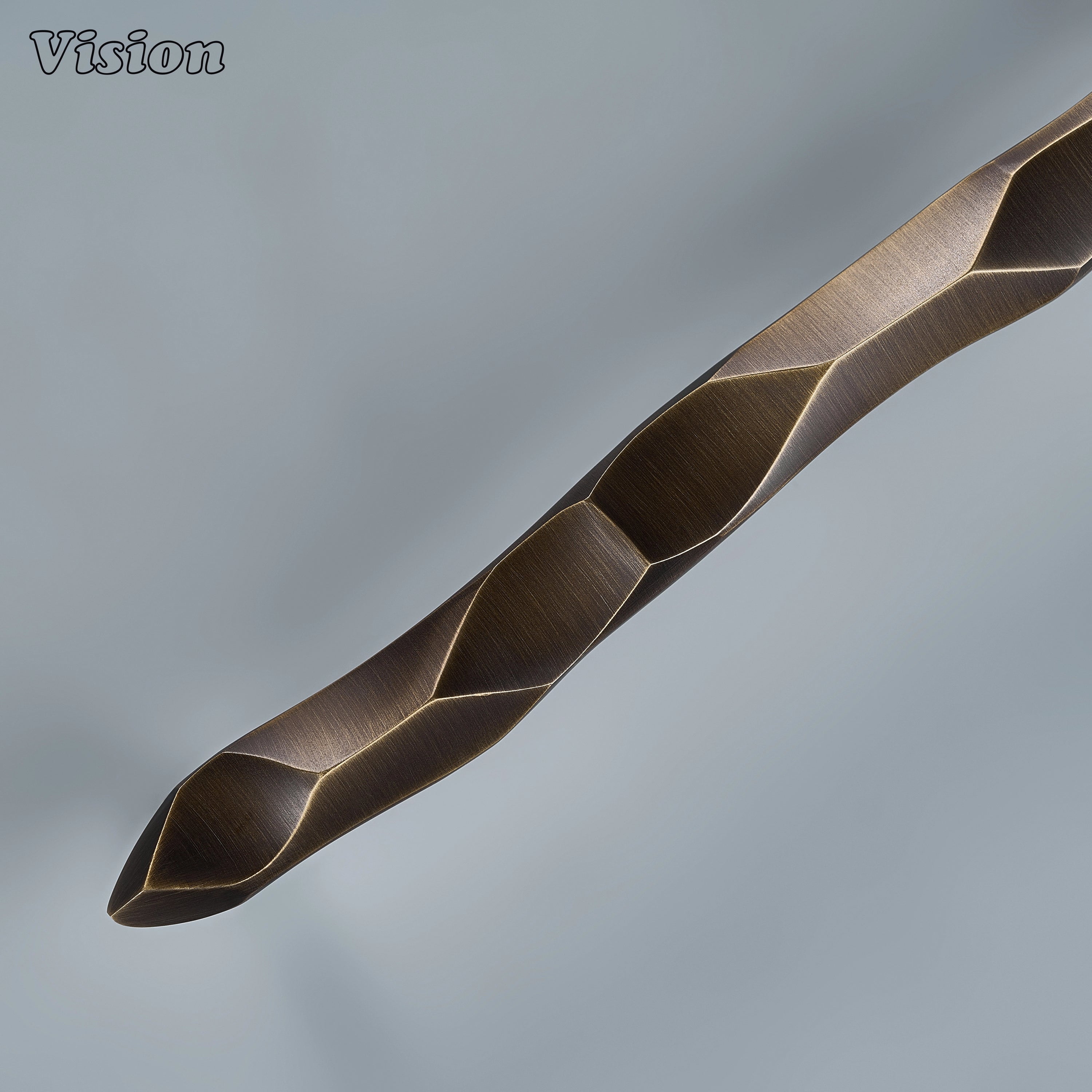 Antique bronze artisanal cabinet handle with tactile stream-like relief for custom joinery