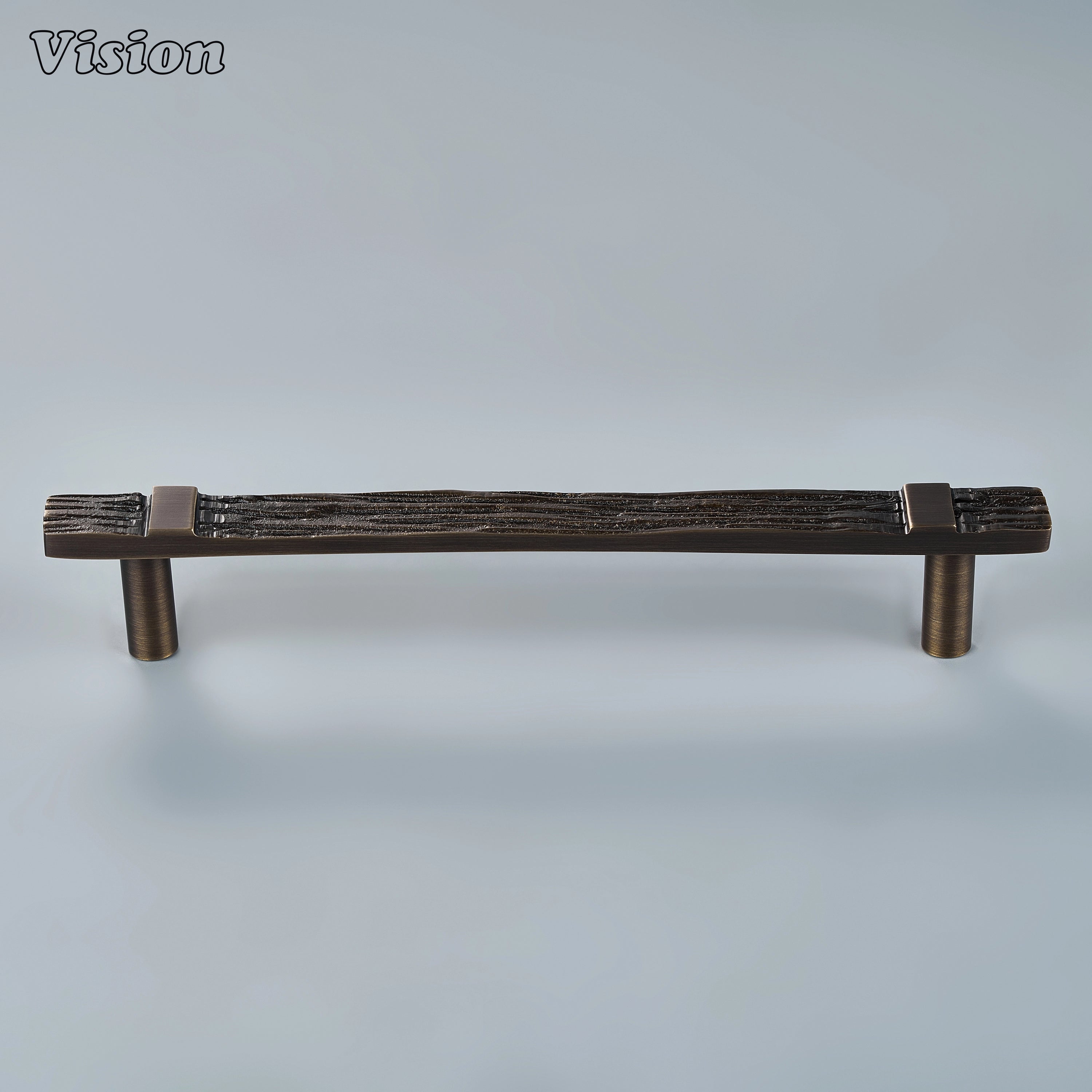 Handcrafted cabinet pull in antique bronze finish featuring a deeply textured bar for wardrobes