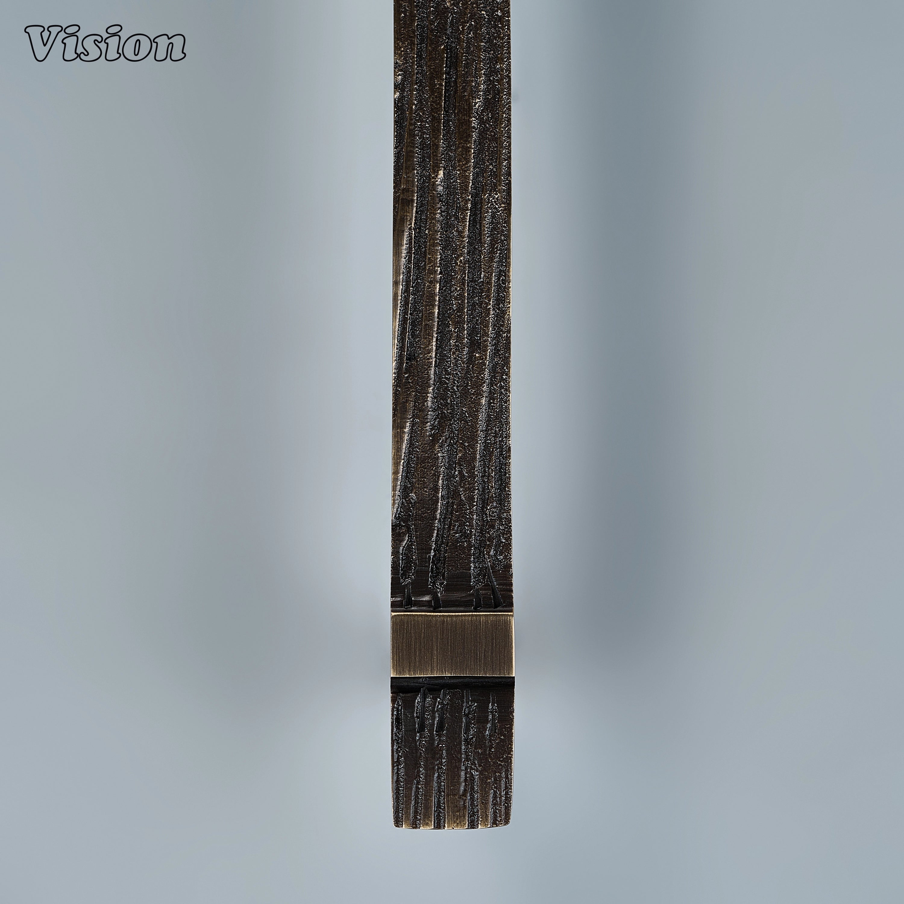 Antique bronze cabinet handle featuring a tactile carved surface for modern dressing tables
