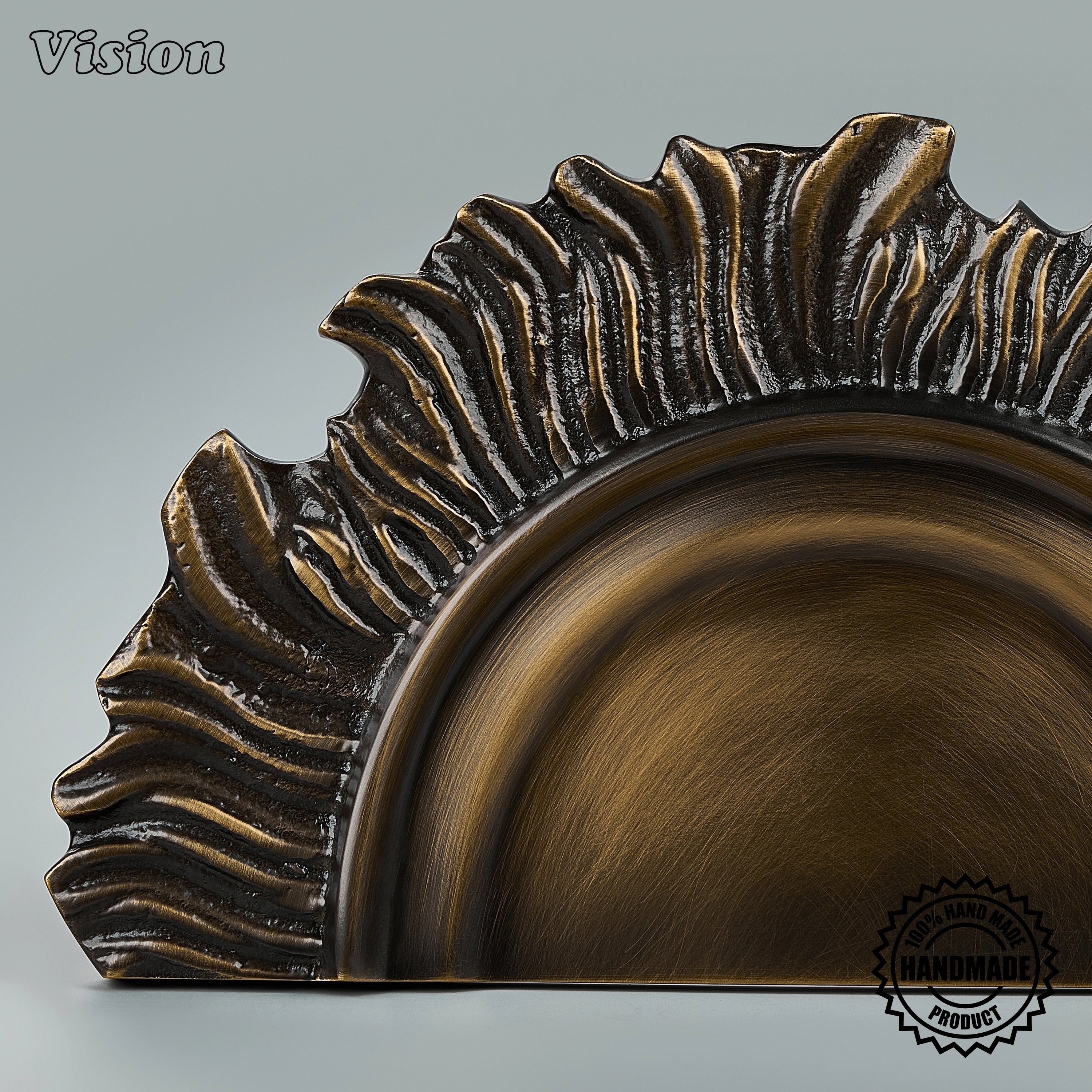 Handcrafted Antique Bronze sunburst brass handle with textured edge detailing for designer entrance doors.