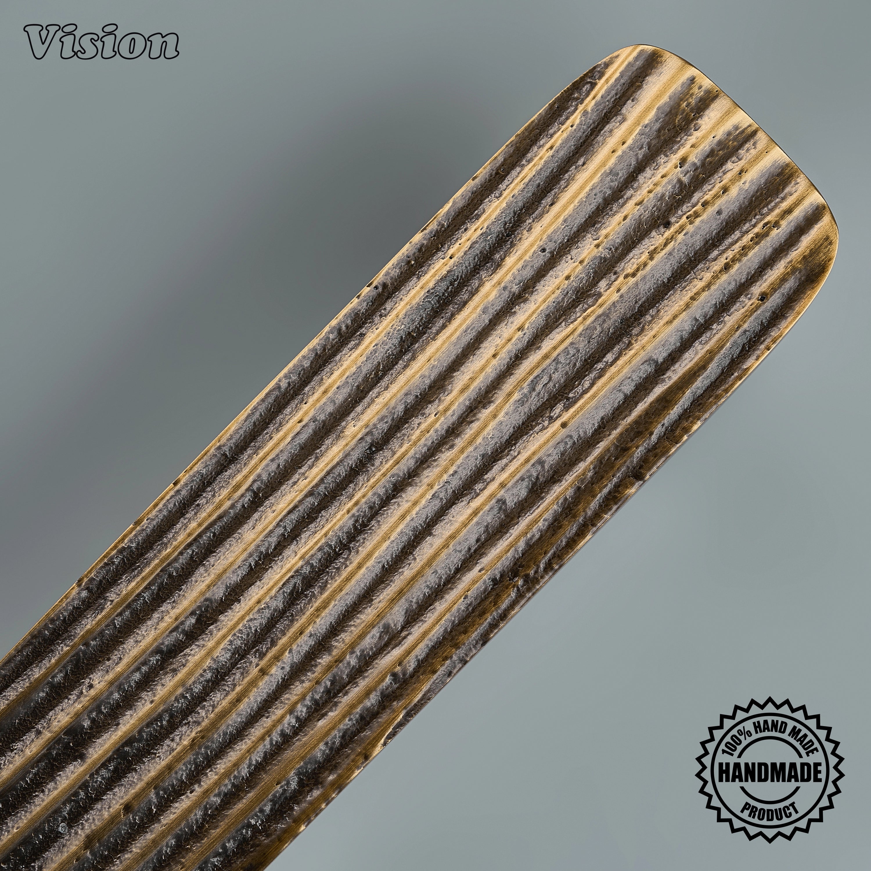 Premium antique bronze ridged brass pull with round mounting posts on integrated dishwashers