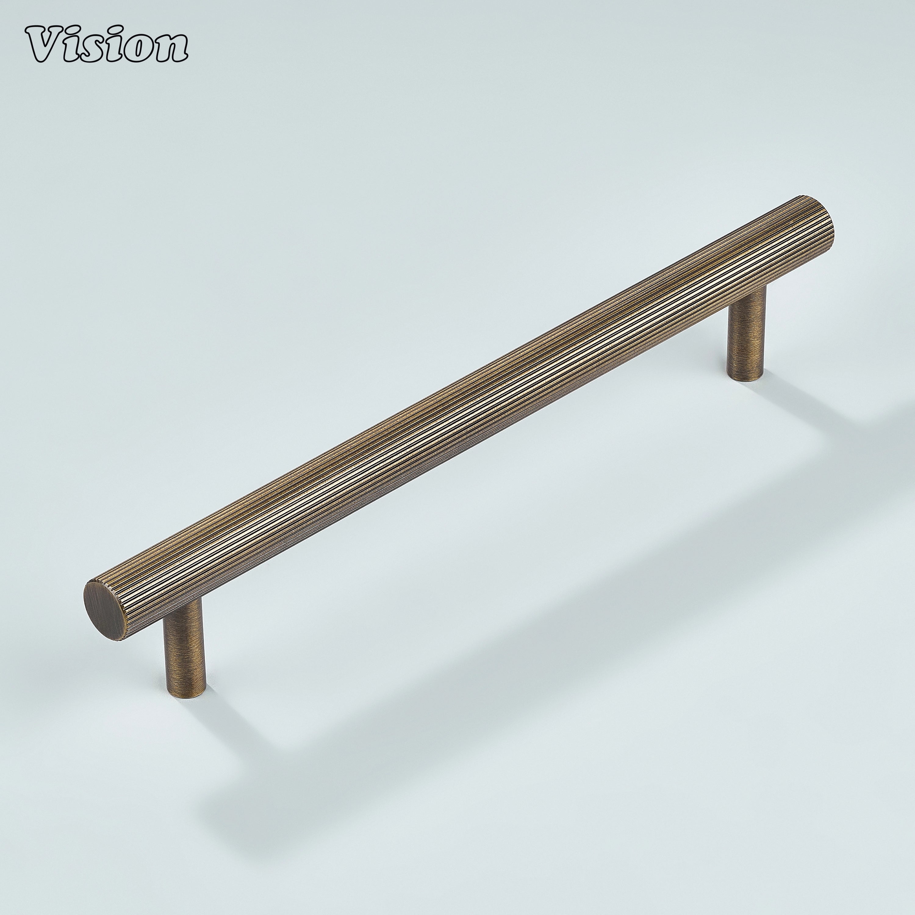 Antique bronze linear knurled pull installed on bathroom vanity units.