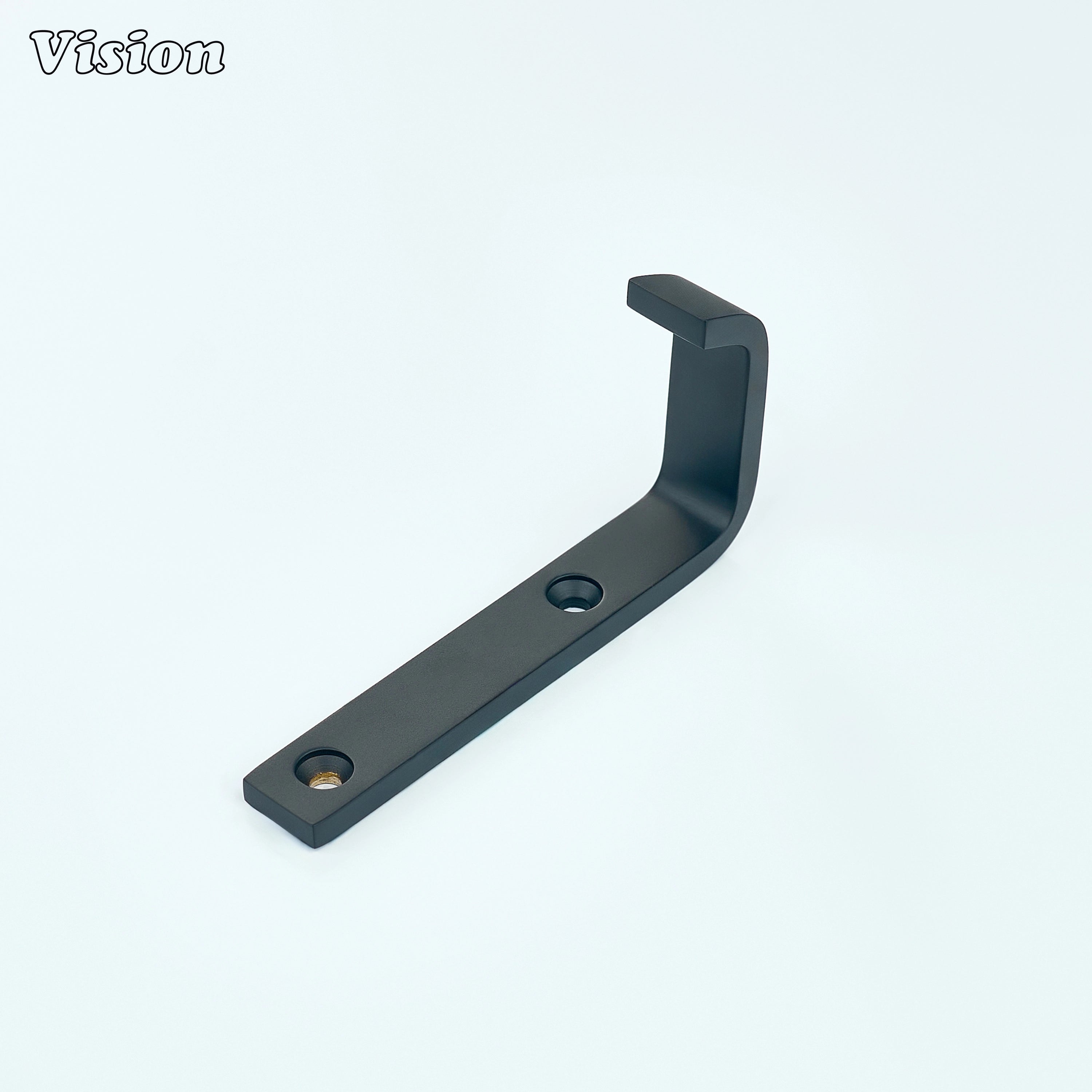 Black brass wall hook with rectangular mounting plate for entryway wall use