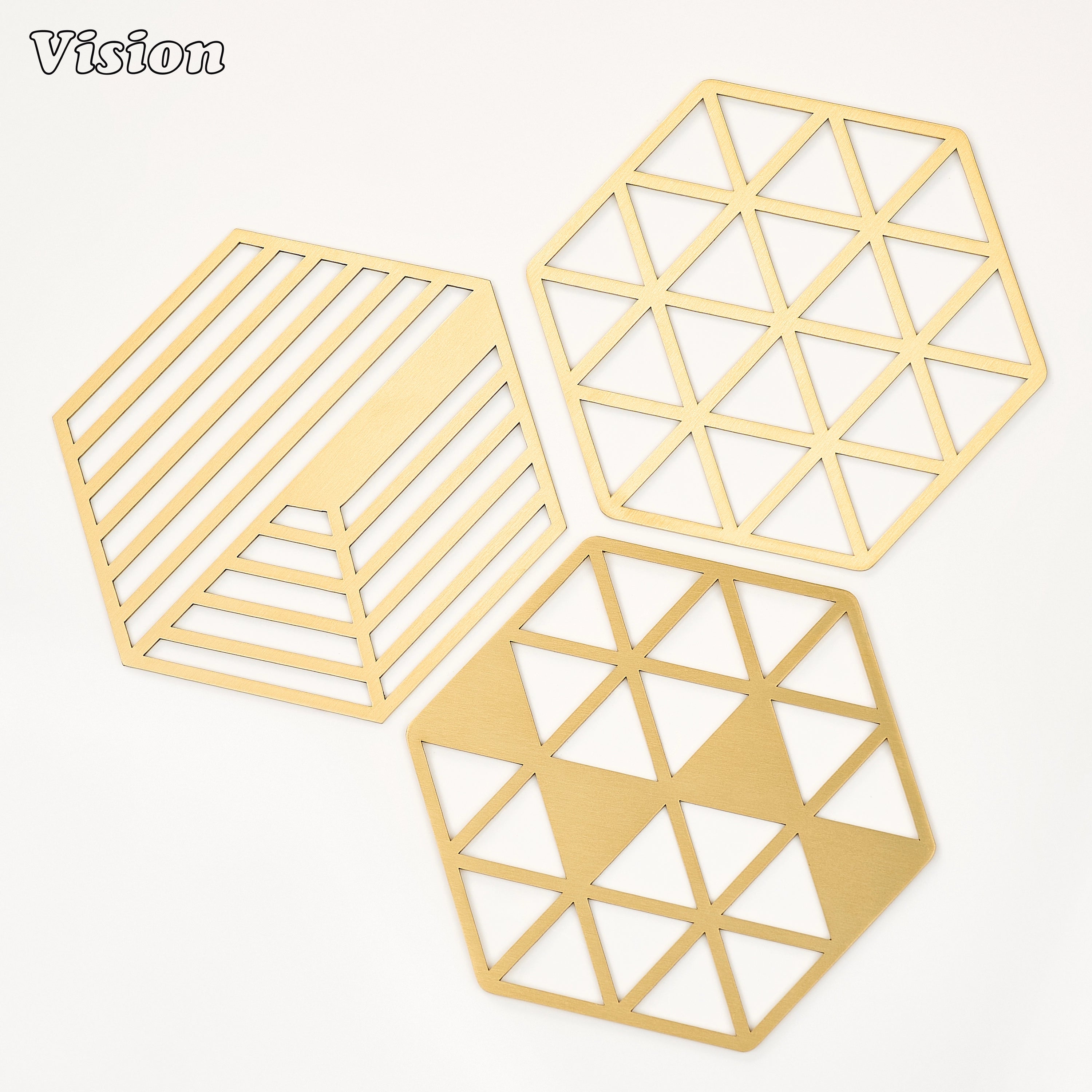 Premium gold geometric brass coaster with open lattice design protecting a marble coffee table