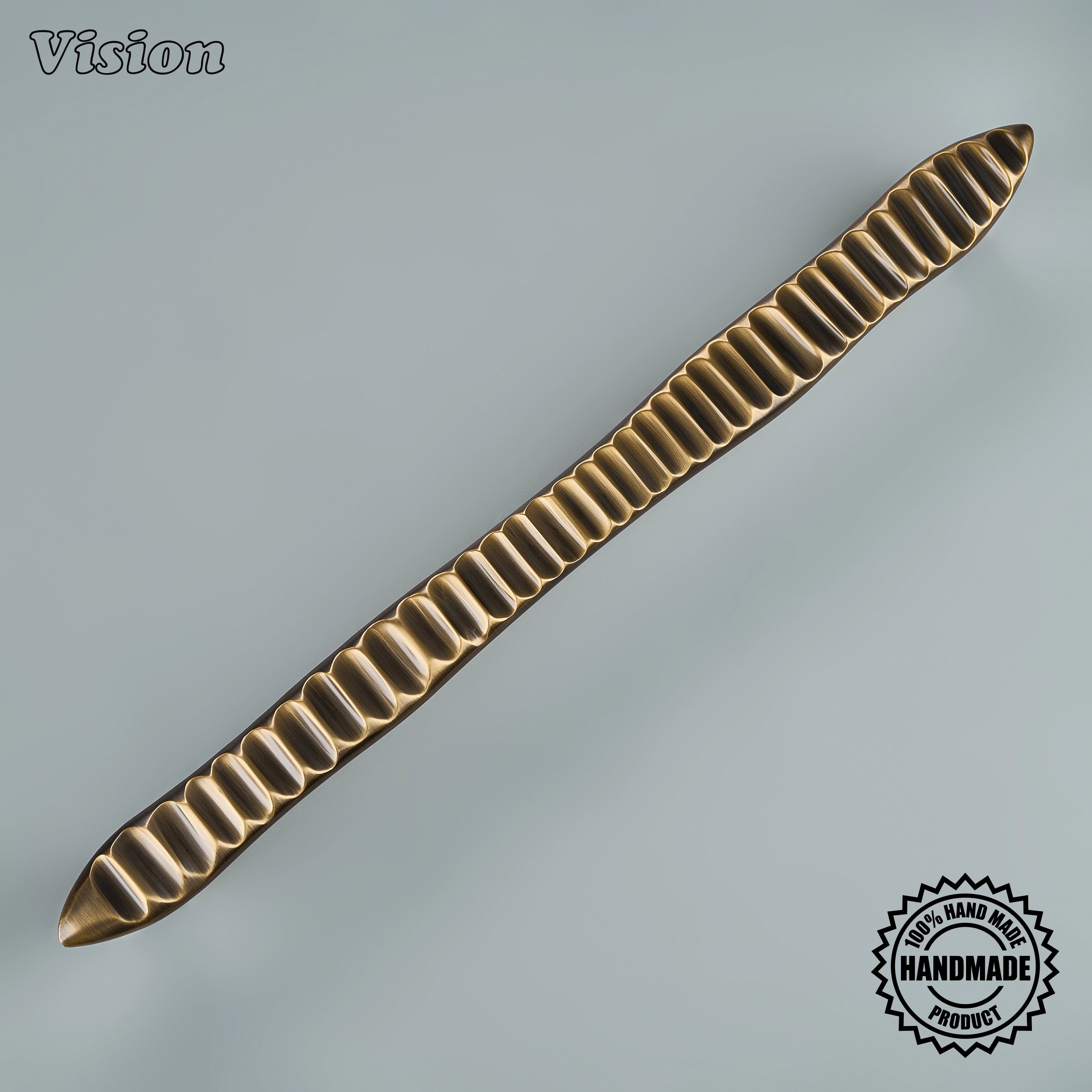 Antique Bronze appliance pull with rounded bar profile for dishwasher front panels.