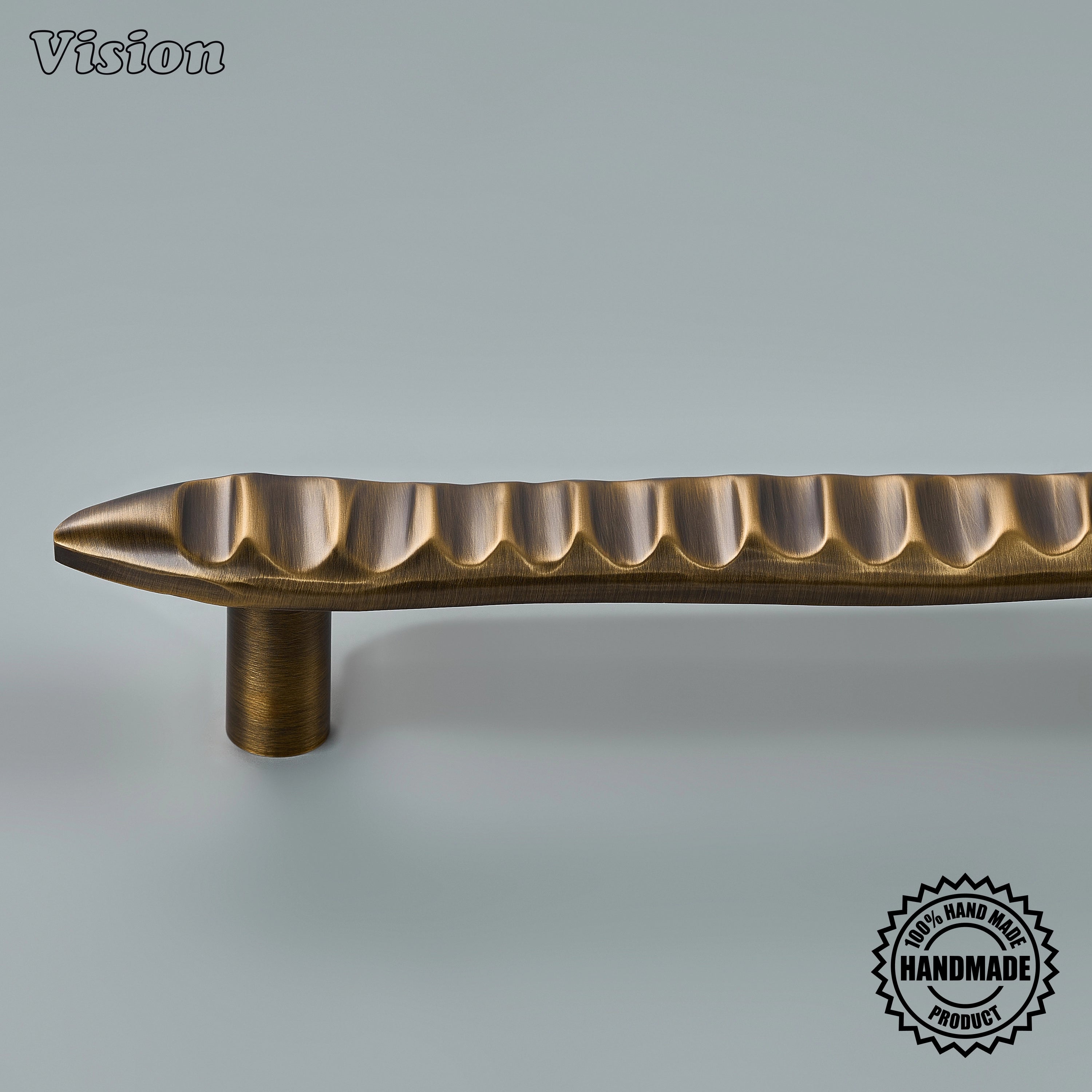 Antique Bronze solid brass appliance handle with wave-inspired detailing for custom furniture.