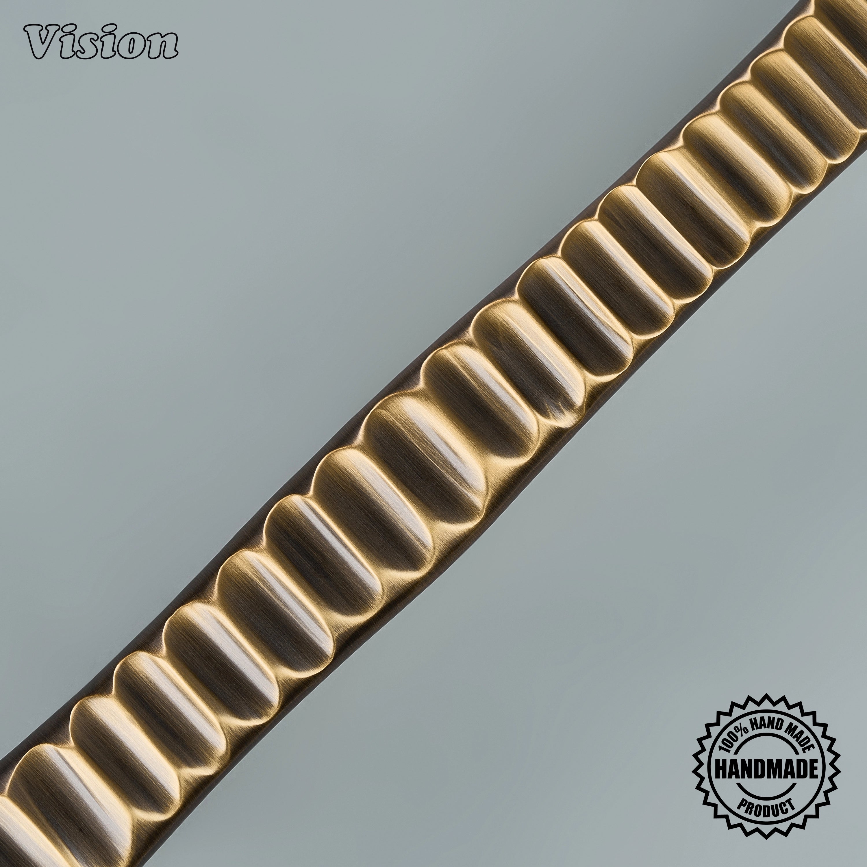 Antique Bronze sculpted brass appliance pull for integrated freezer and refrigerator panels.