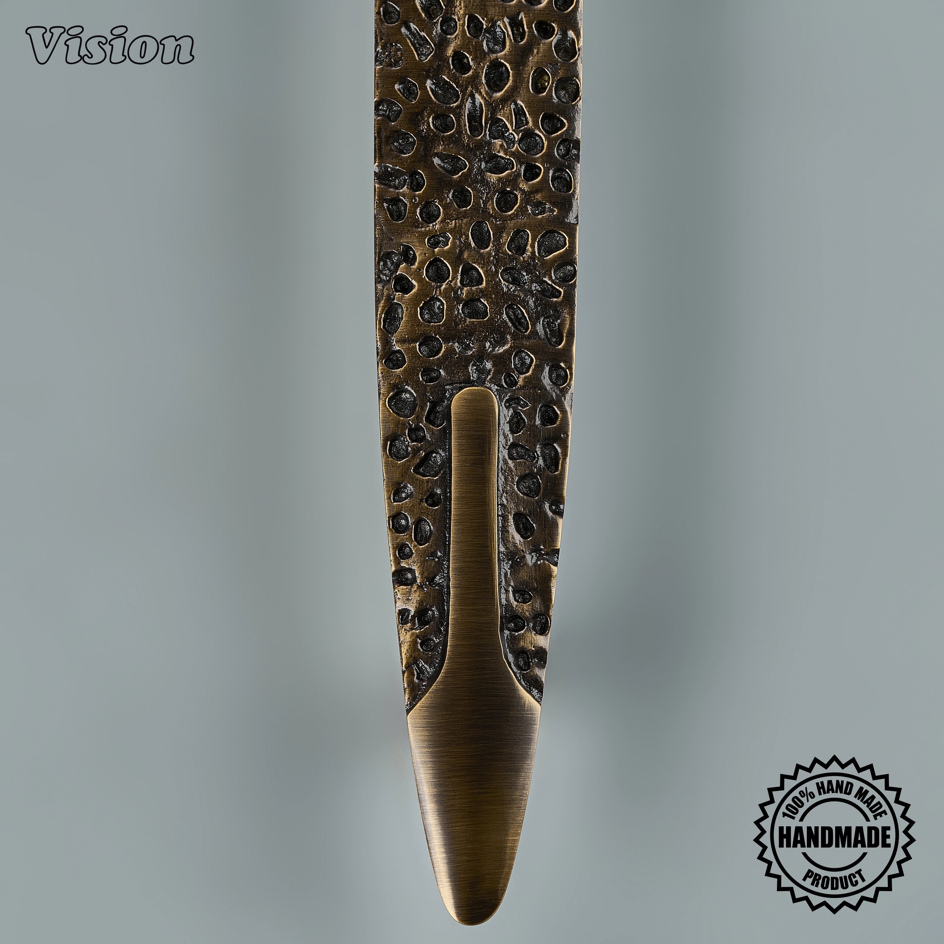 Antique Bronze premium cabinet handle with organic textured face and rounded supports for tall wardrobe doors.