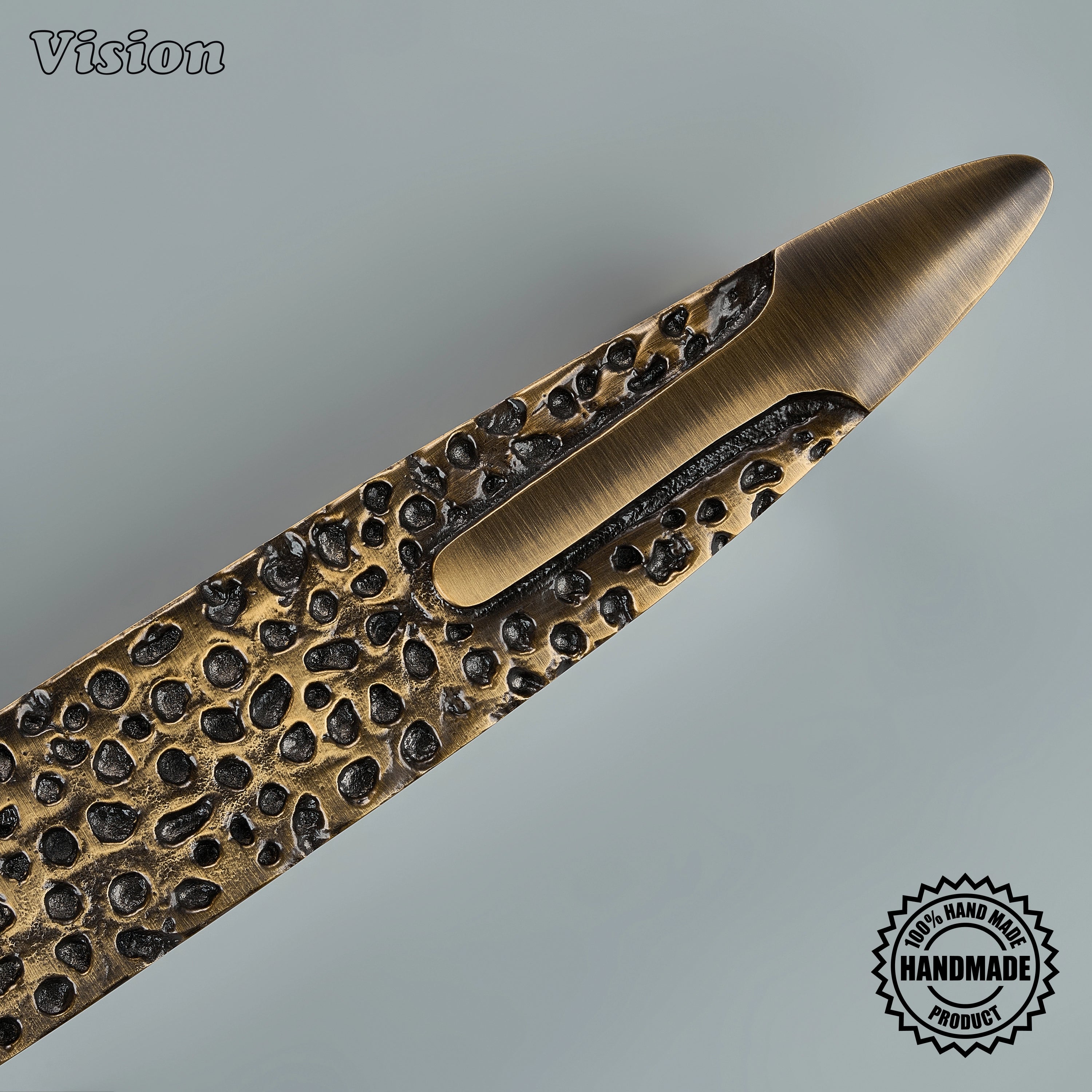 Antique Bronze luxury appliance pull with handcrafted organic texture and smooth grip detail for oversized cabinet drawers.