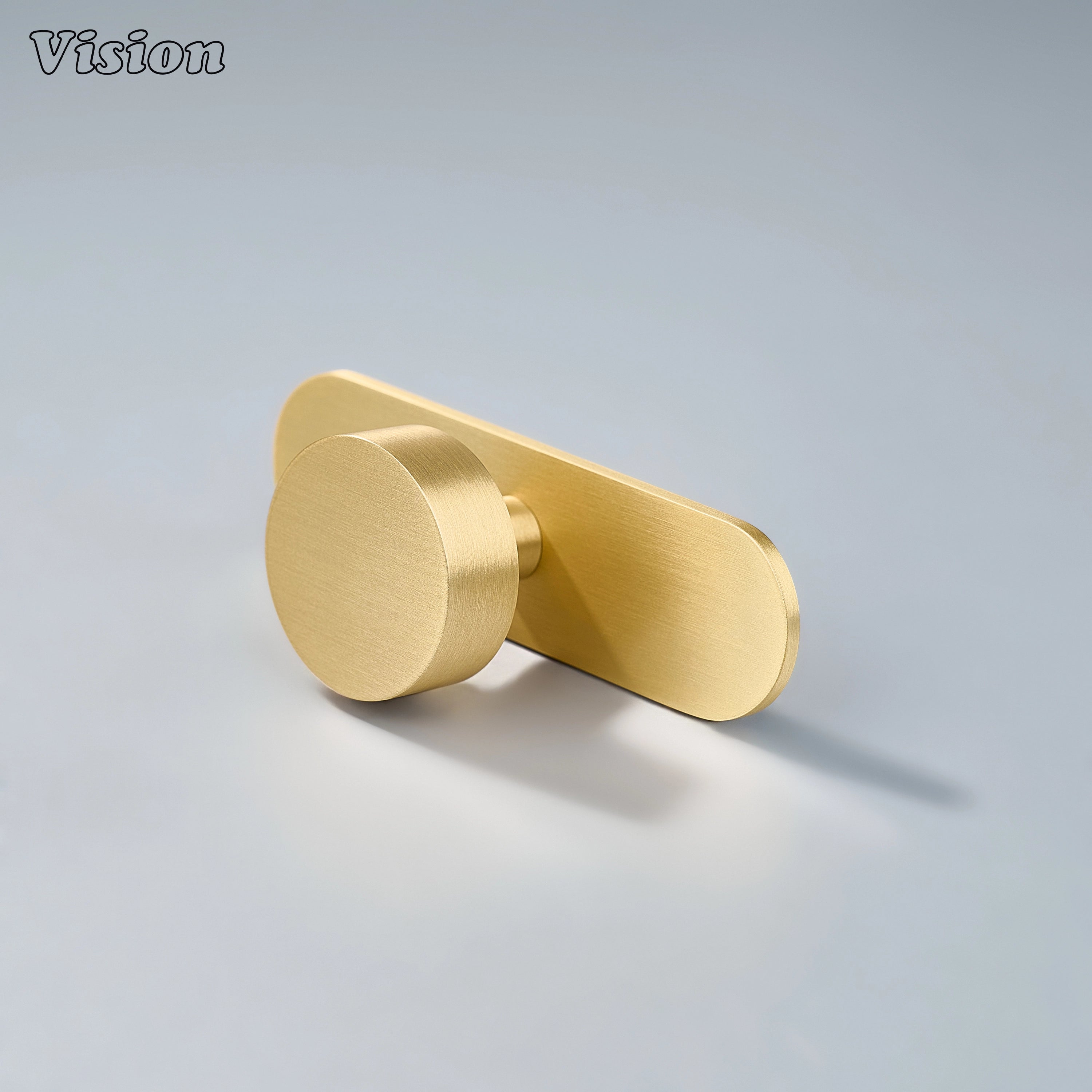 Plain round cabinet knob in Gold finish with slim backplate for drawer fronts