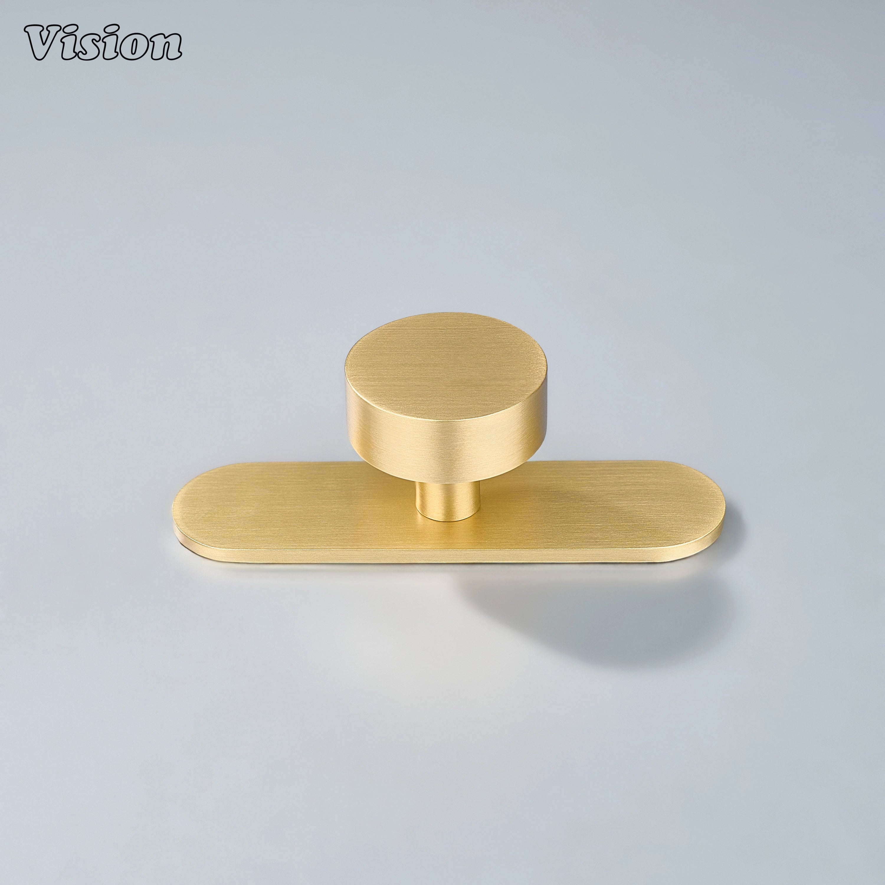 Gold finish cabinet knob with clean round shape and backplate for wardrobe drawers
