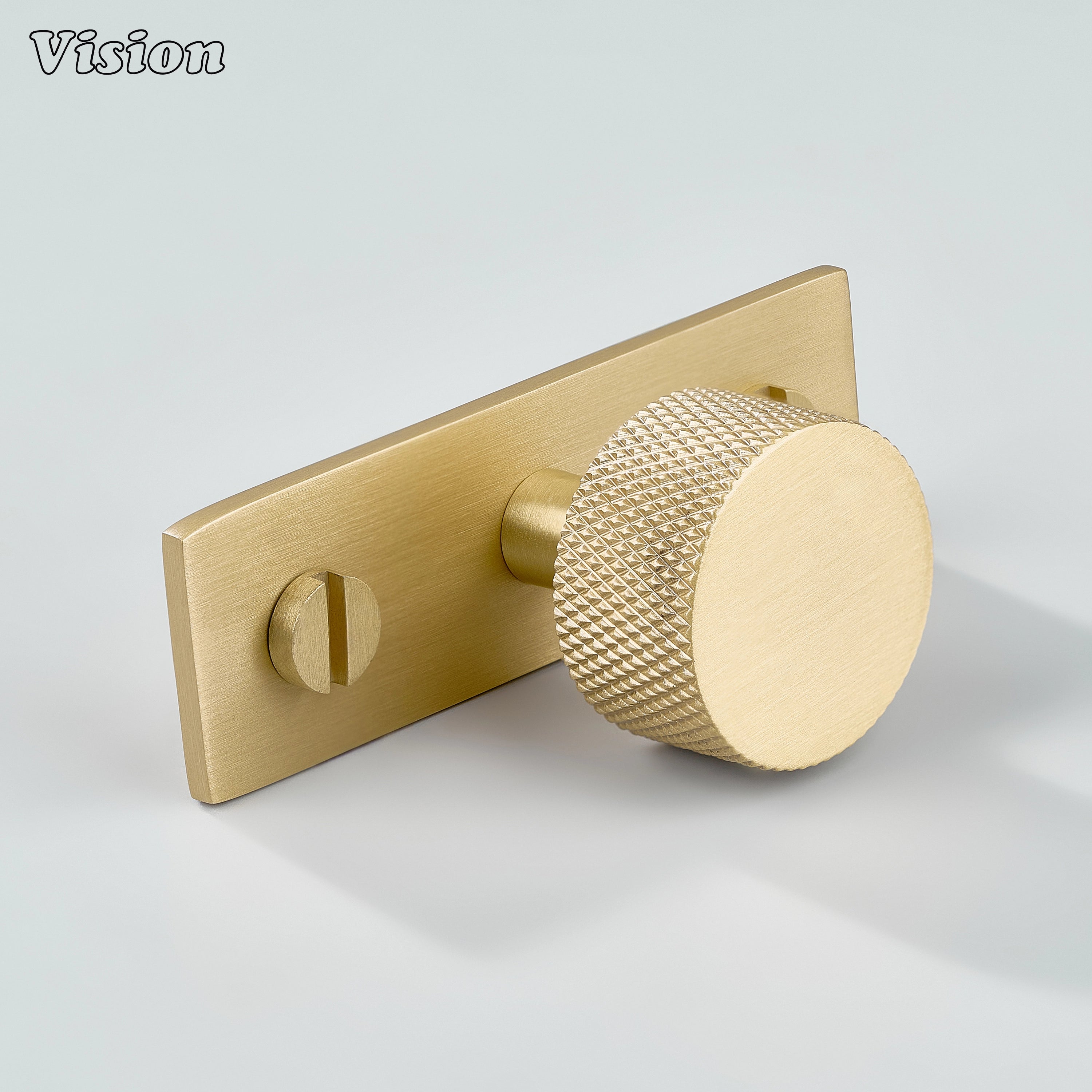 Gold cabinet knob with knurled round profile and plate for modern furniture