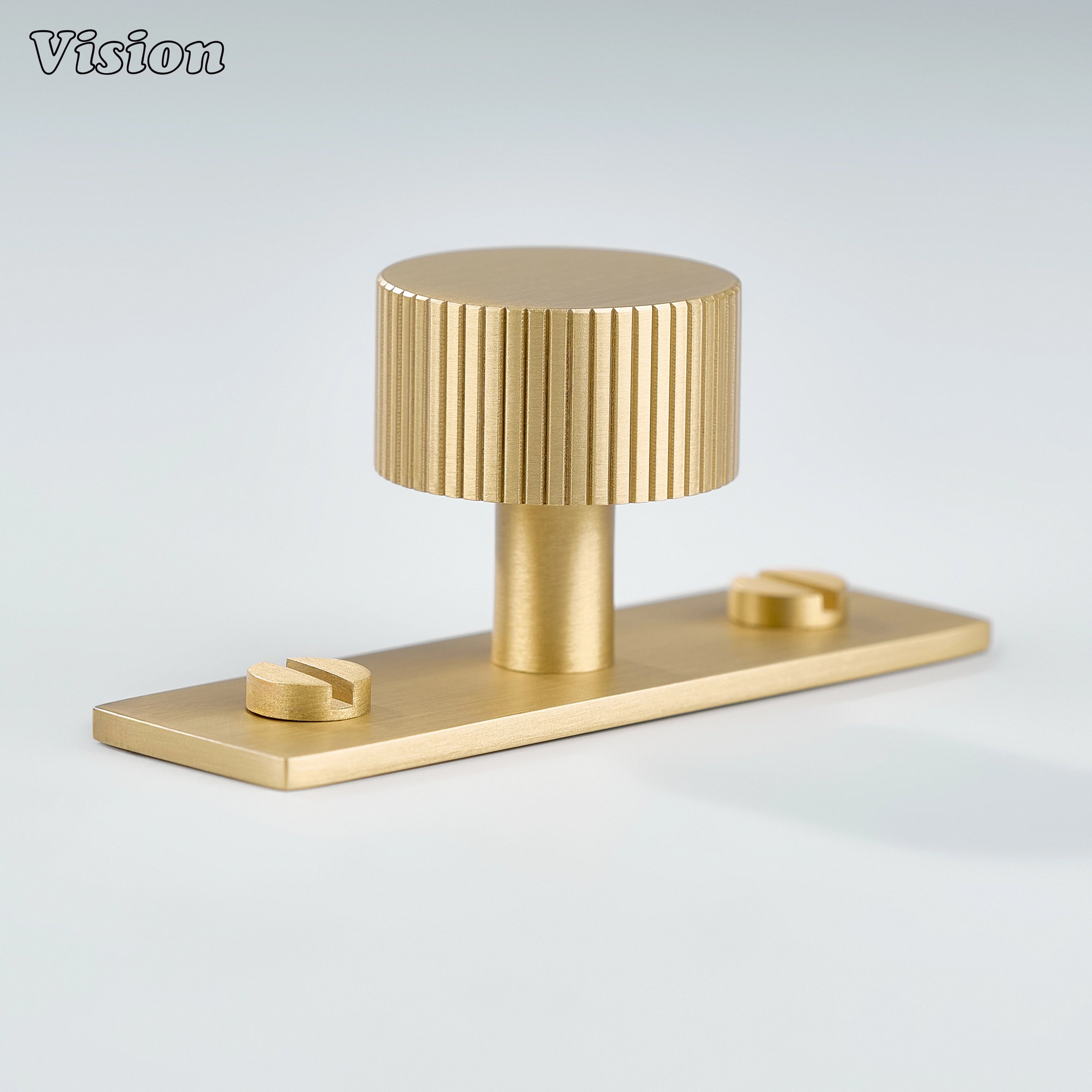 Gold cabinet knob with linear knurled texture and backplate for storage drawers